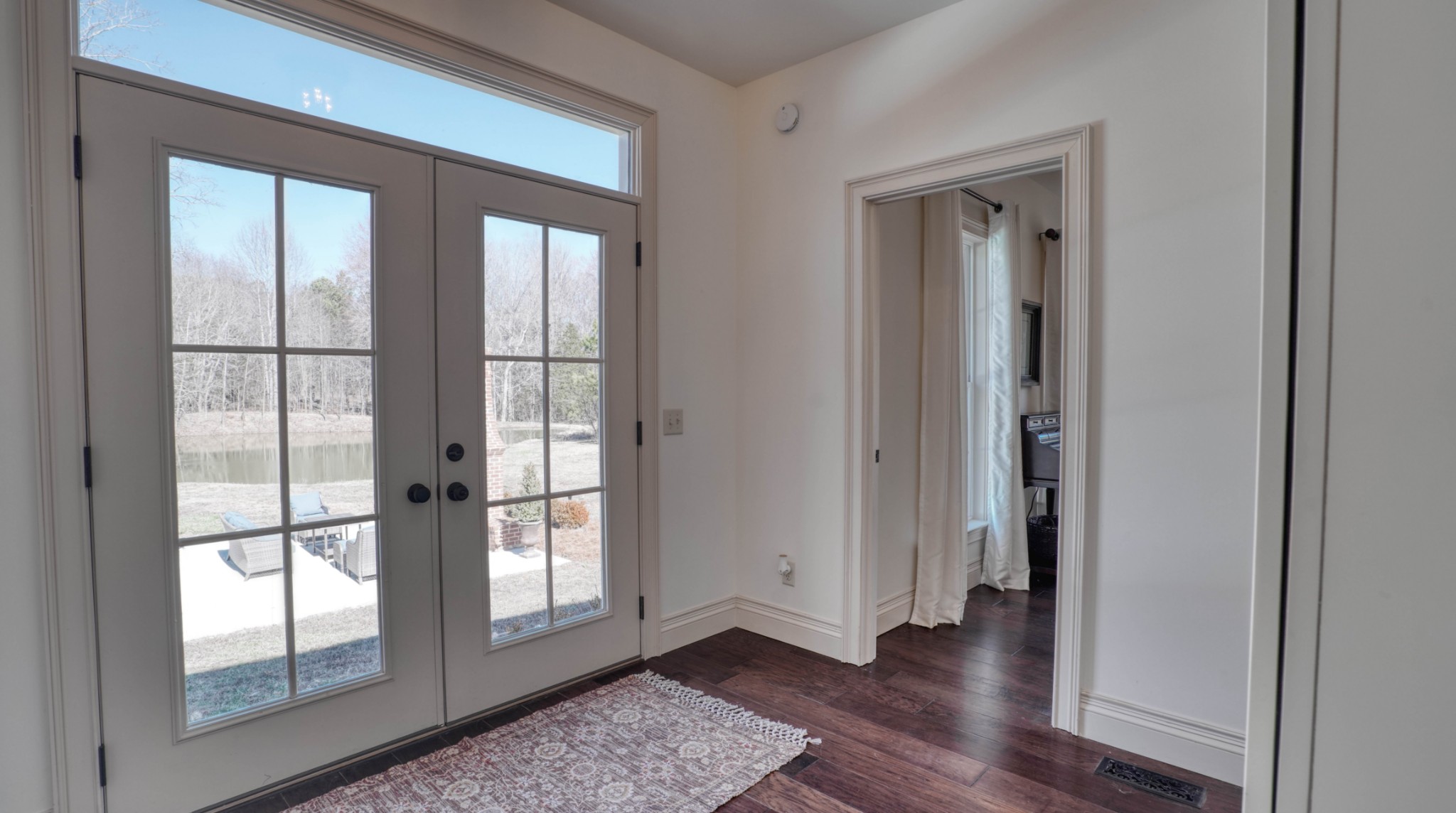 1368 Tidwell Switch Road Dickson, TN 37055 - Photo 36 of 69 a view of empty room with wooden floor and fan