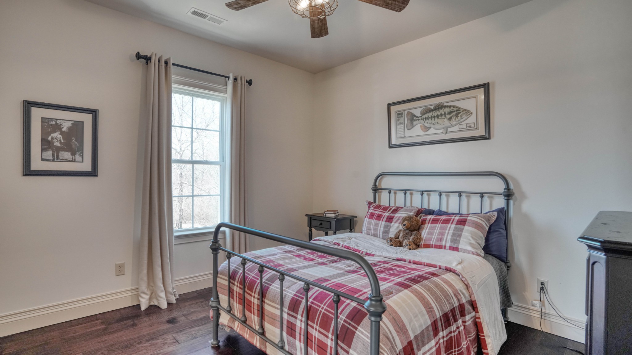 1368 Tidwell Switch Road Dickson, TN 37055 - Photo 45 of 69 a bedroom with a bed and a chandelier