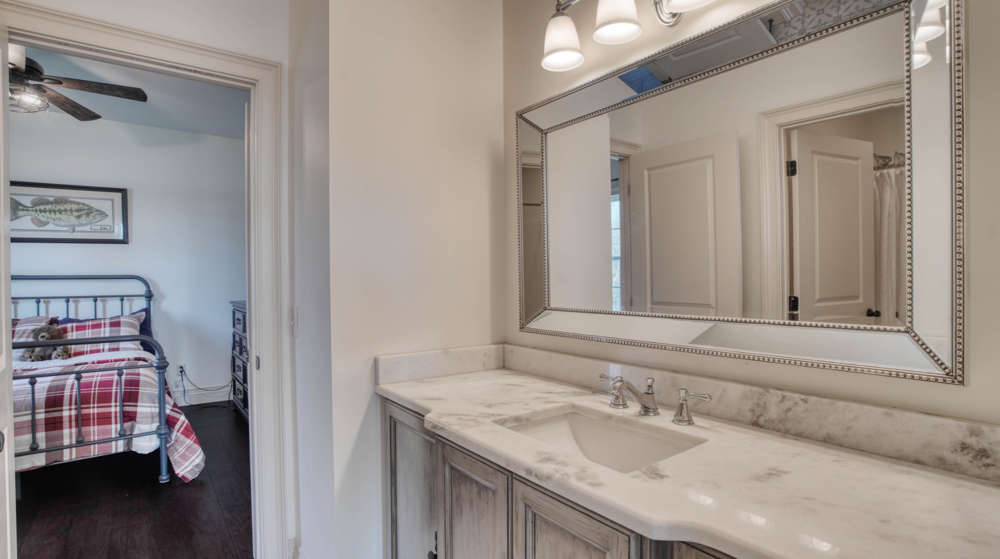 1368 Tidwell Switch Road Dickson, TN 37055 - Photo 50 of 69 a bathroom with a granite countertop sink and a mirror