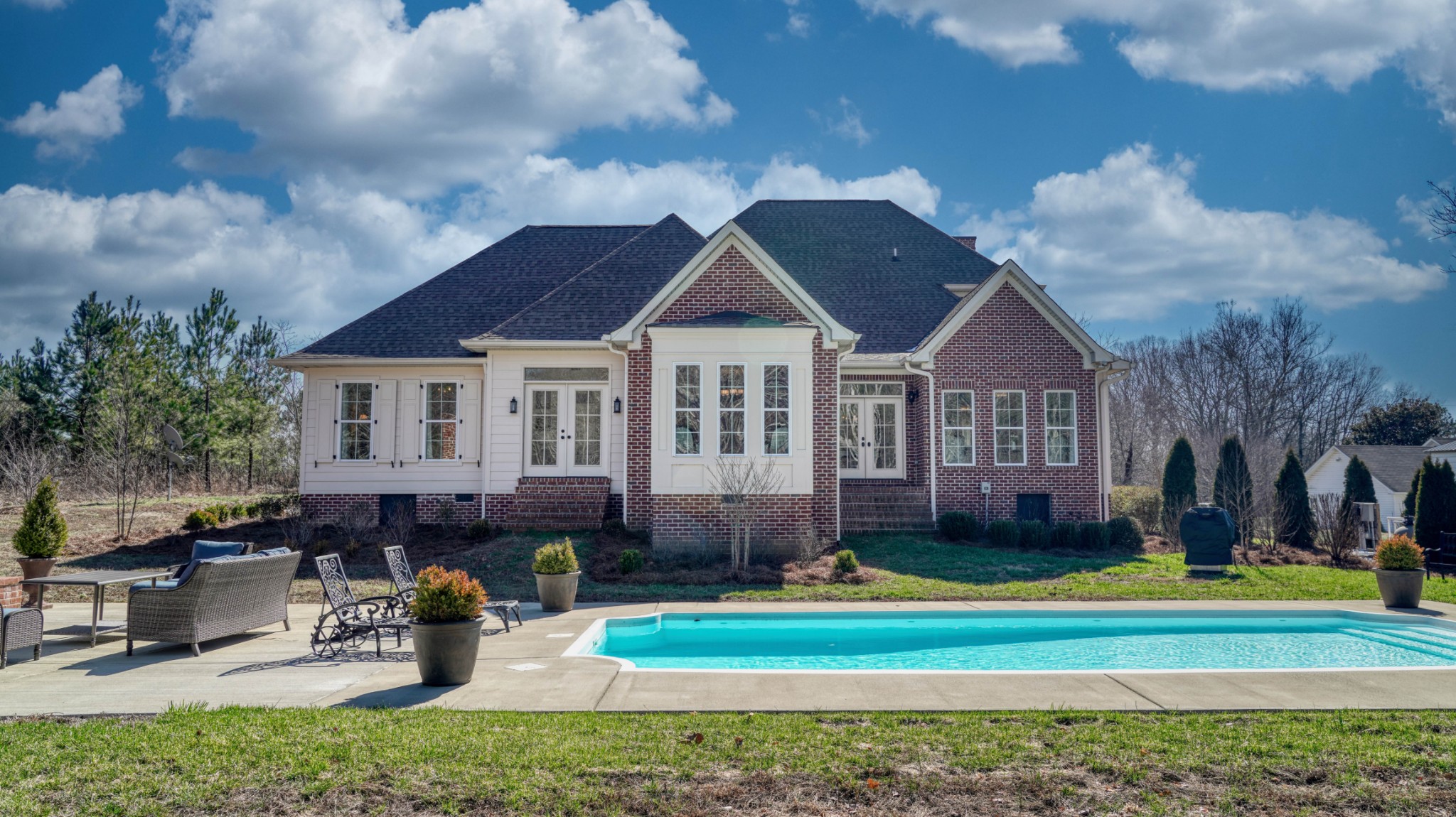 1368 Tidwell Switch Road Dickson, TN 37055 - Photo 55 of 69 a front view of a house with a yard table and chairs