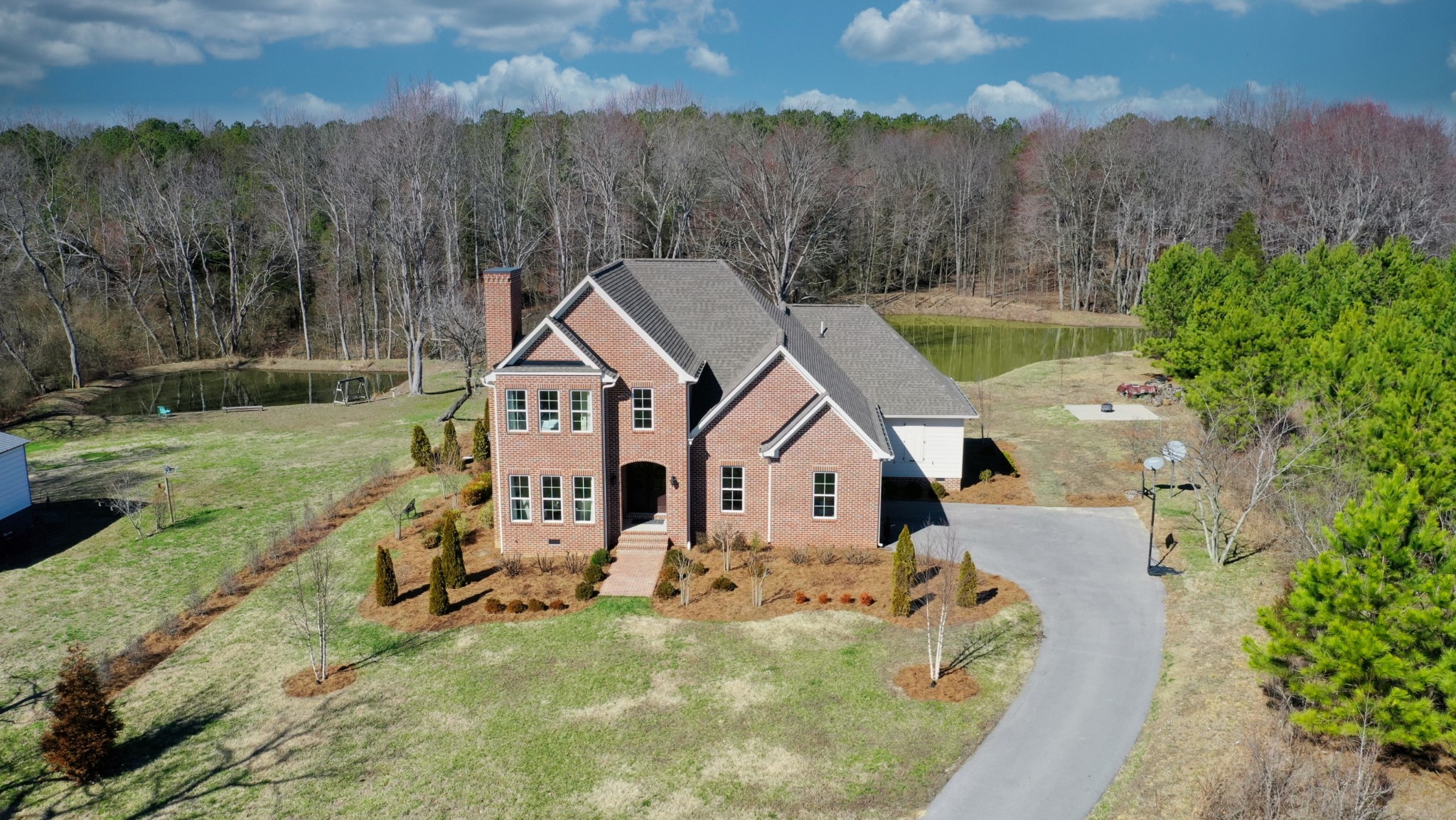 1368 Tidwell Switch Road Dickson, TN 37055 - Photo 68 of 69 an aerial view of a house with swimming pool and big yard