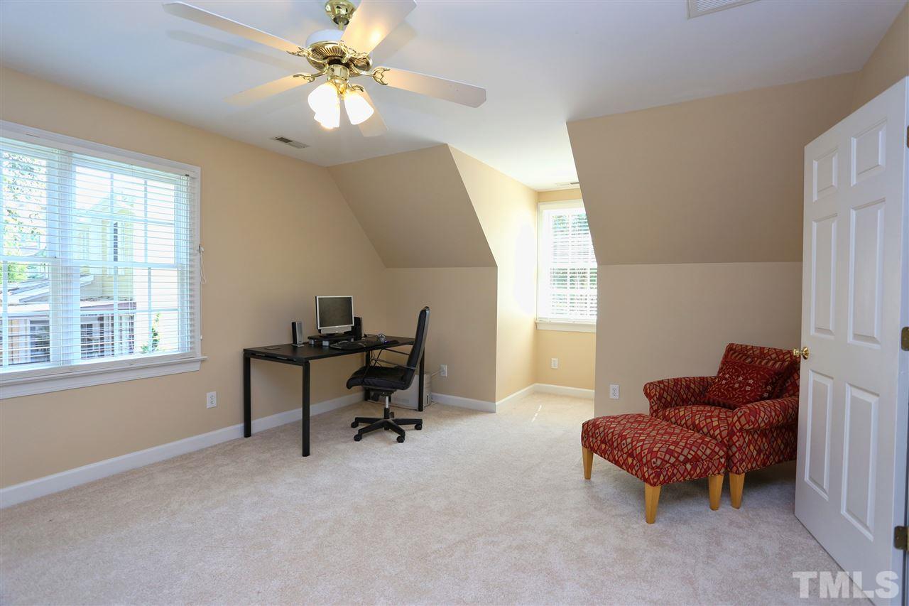 202 Manor Ridge Road Carrboro, NC 27510 - Photo 16 of 25 a living room with furniture and a window