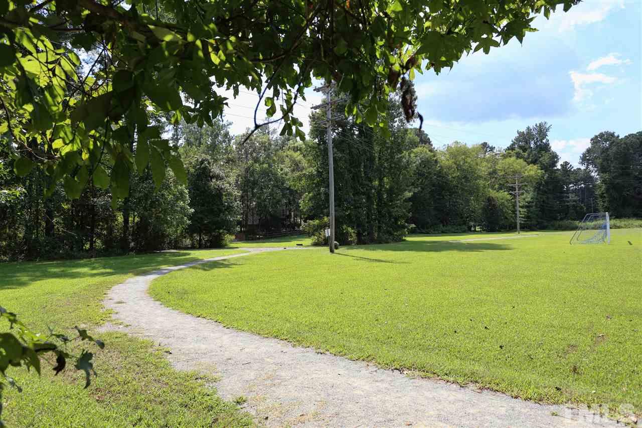 202 Manor Ridge Road Carrboro, NC 27510 - Photo 23 of 25 a view of a tennis court