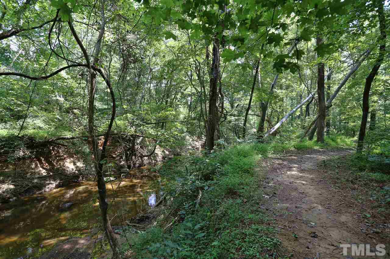 202 Manor Ridge Road Carrboro, NC 27510 - Photo 25 of 25 a view of a forest that has large trees
