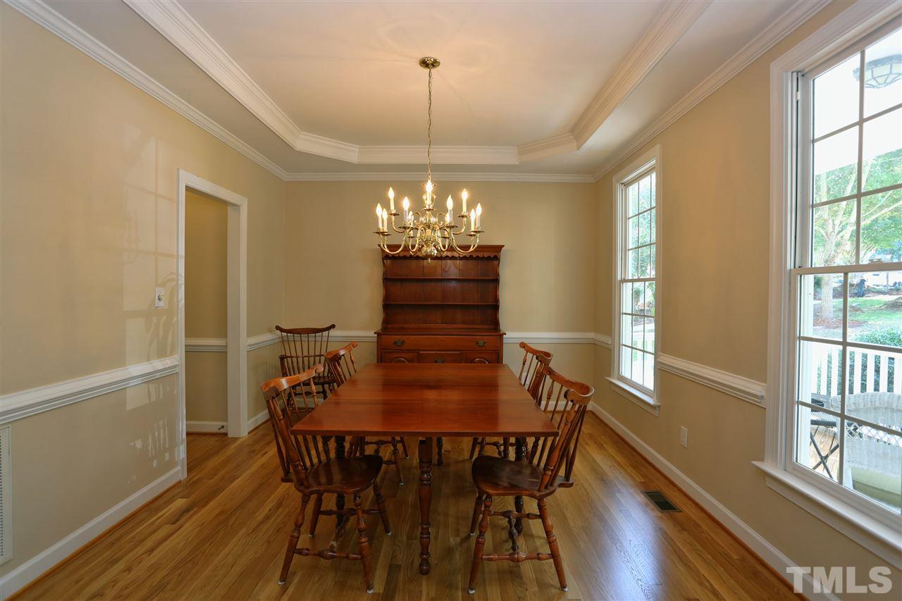 202 Manor Ridge Road Carrboro, NC 27510 - Photo 10 of 25 a view of a dining room with furniture window and wooden floor