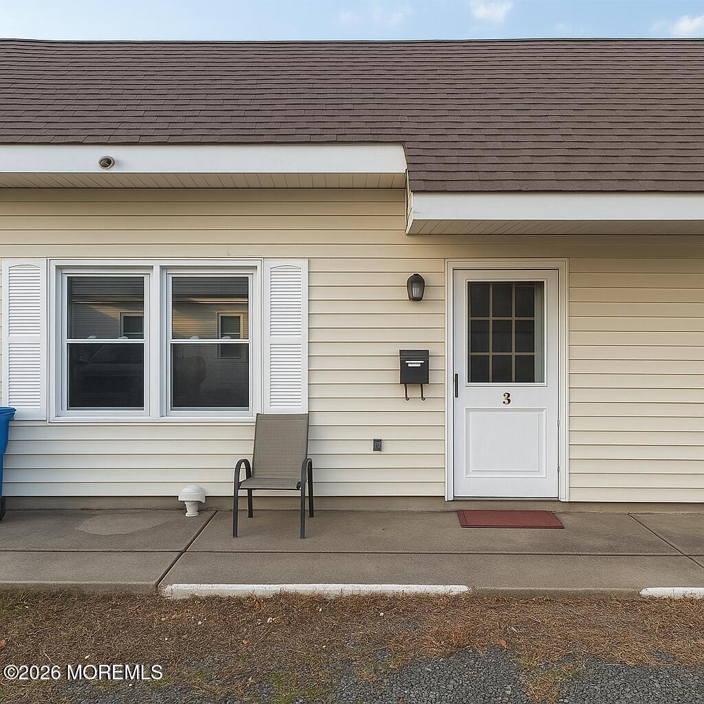 273 Port Monmouth Road, Unit 3 Middletown, NJ 07748 - Photo 2 of 5 a view of a house with a patio