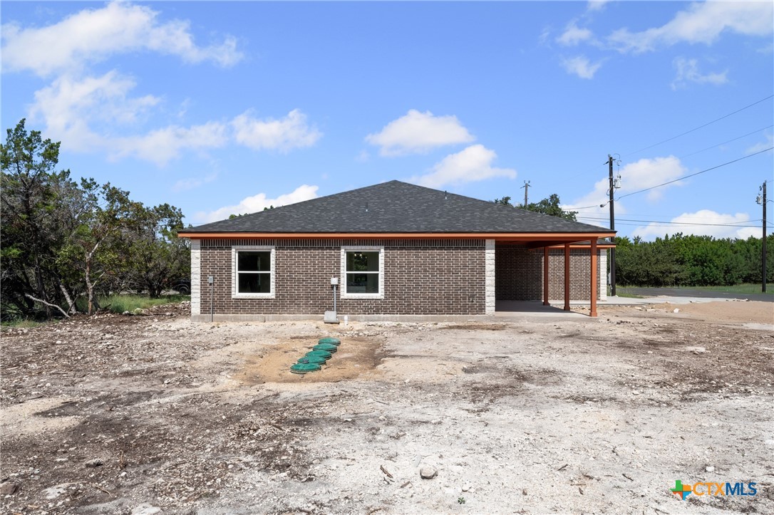 5165 Comanche Drive Temple, TX 76502 - Photo 40 of 41 a front view of a house with a yard and garage
