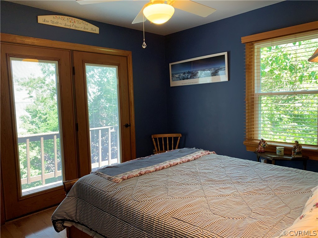 1093 Sunken Meadow Road Spring Grove, VA 23881 - Photo 34 of 47 3rd Bedroom with deck and view of river