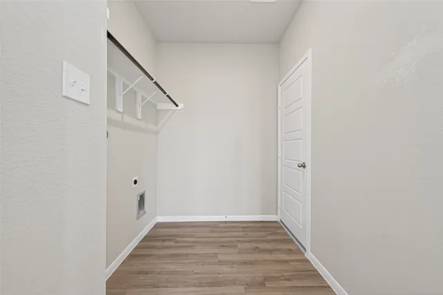 a view of an empty walk in closet