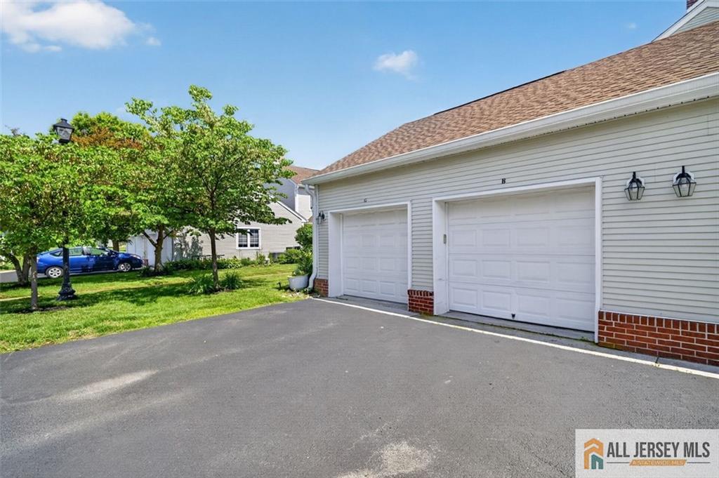 40C Rutland Lane, Unit 40B Monroe Township, NJ 08831 - Photo 32 of 37 a view of a house with a street