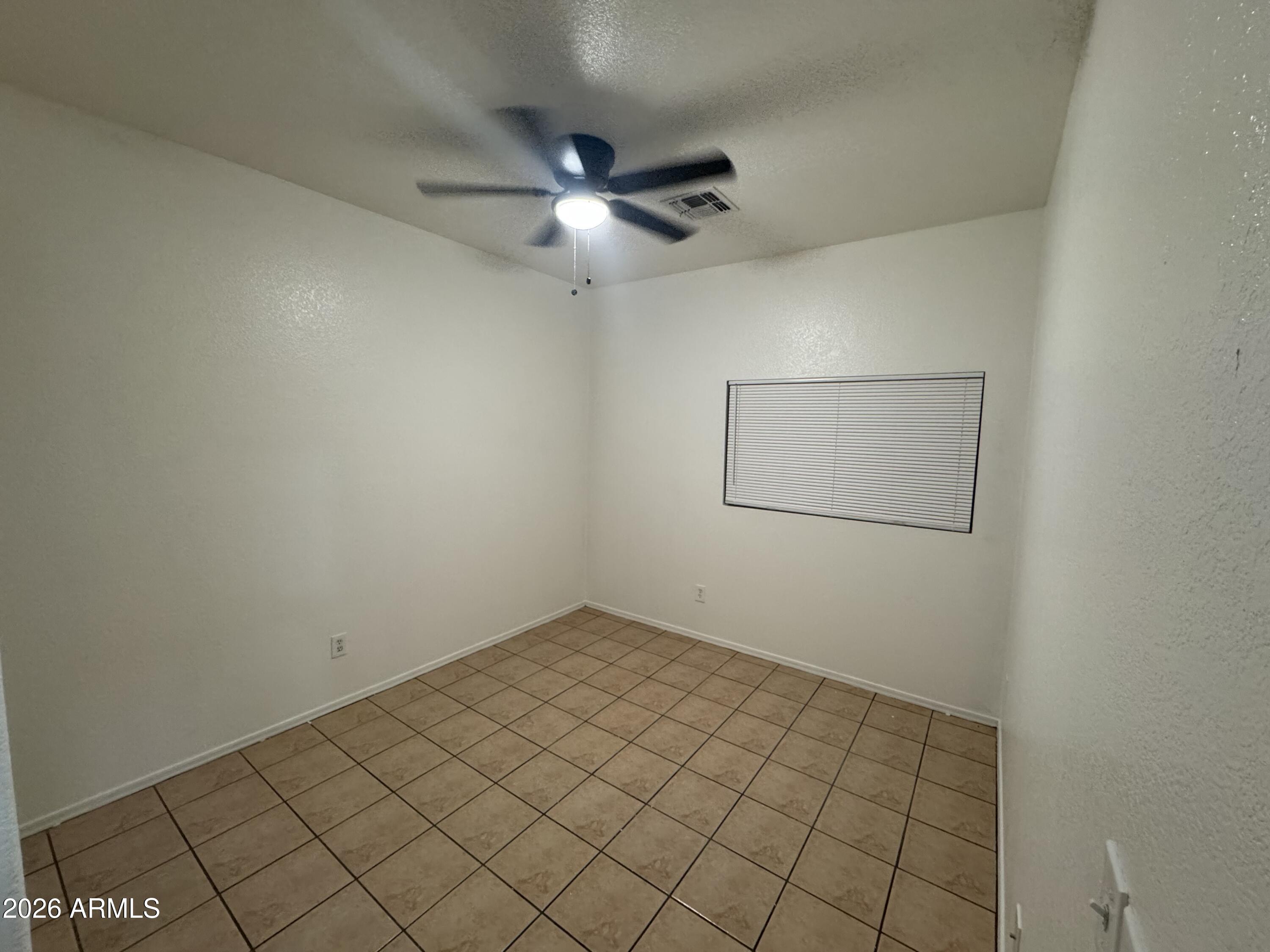 9730 West Payson Road Tolleson, AZ 85353 - Photo 49 of 57 a view of an empty room