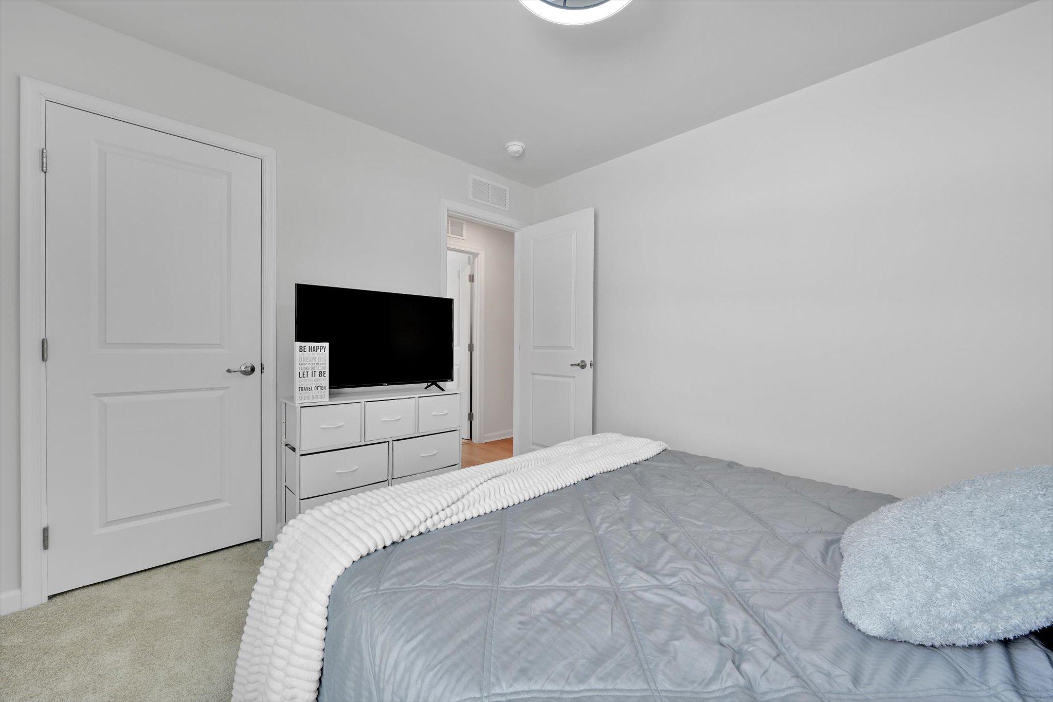415 Courtland Road Atglen, PA 19310 - Photo 15 of 26 a bedroom with a bed and a television
