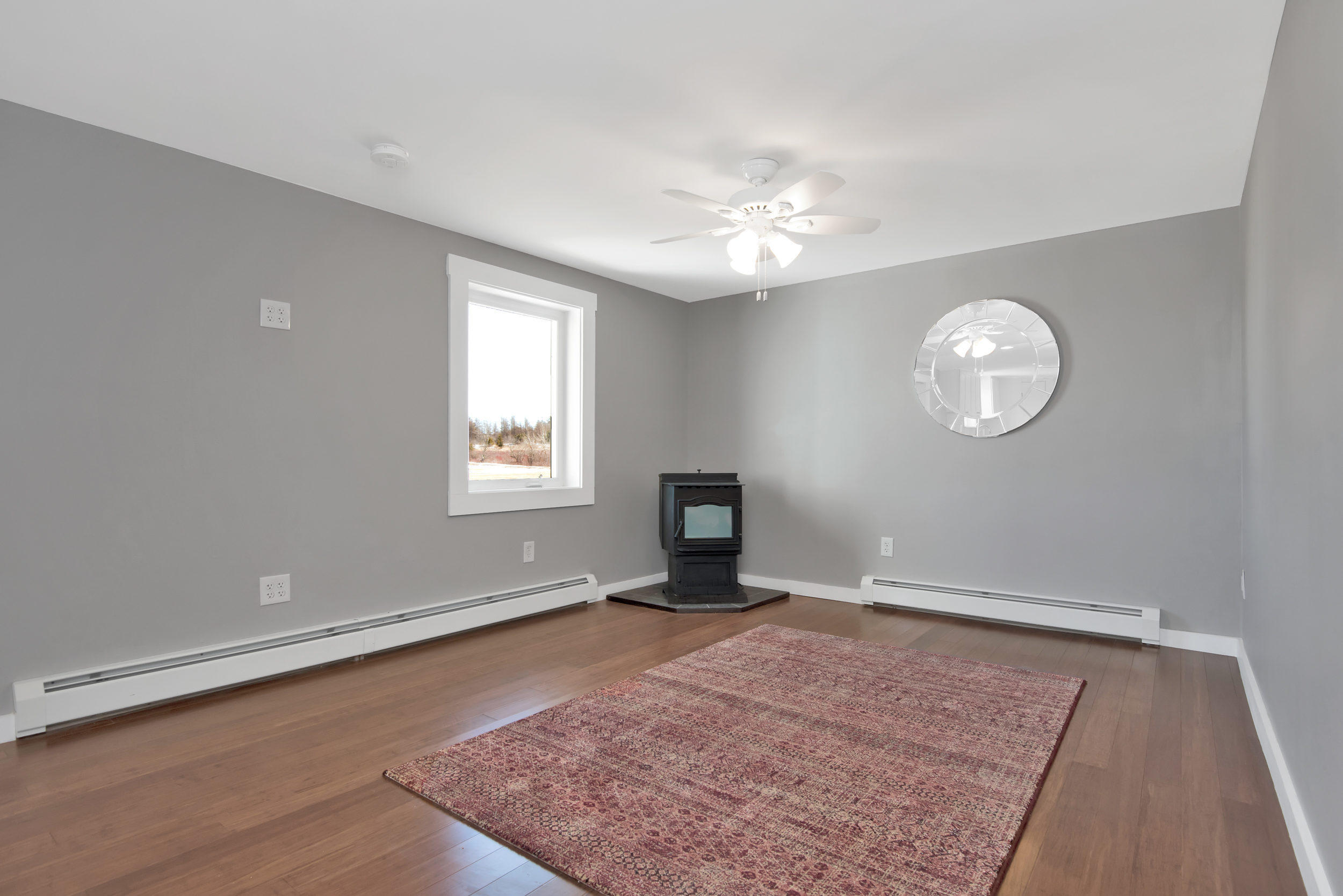 190 St George Road South Thomaston, ME 04858 - Photo 8 of 44 Pellet stove and ceiling fan