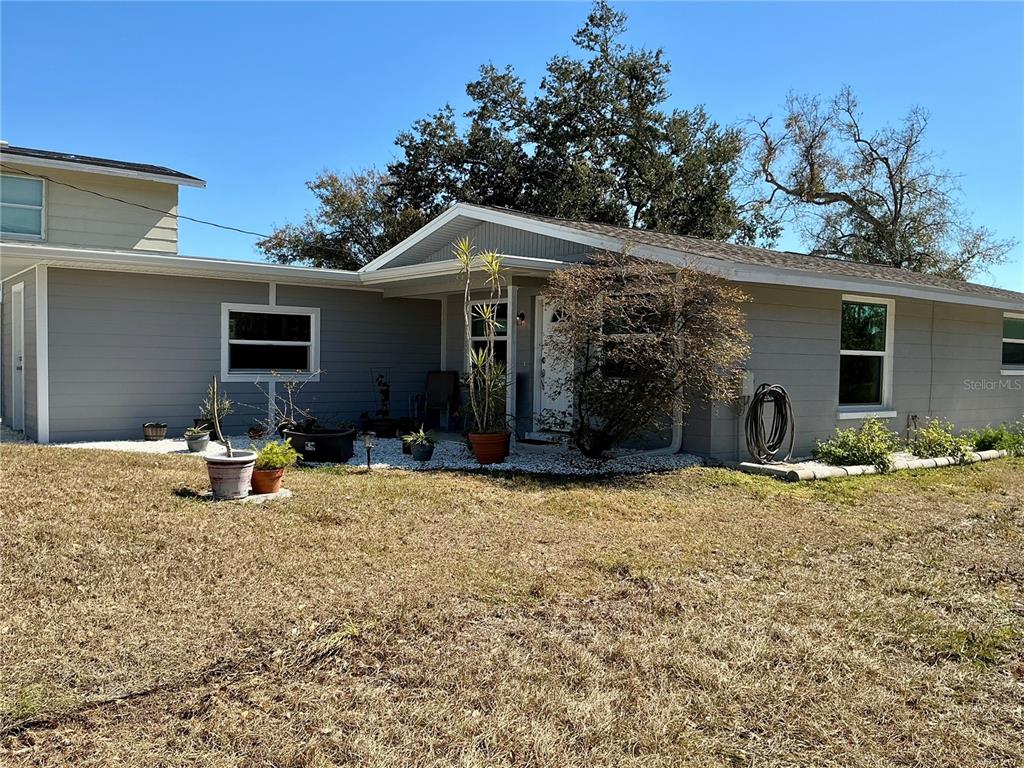 3020 Hawthorne Street Sarasota, FL 34239 - Photo 18 of 22 a view of a house with backyard and furniture