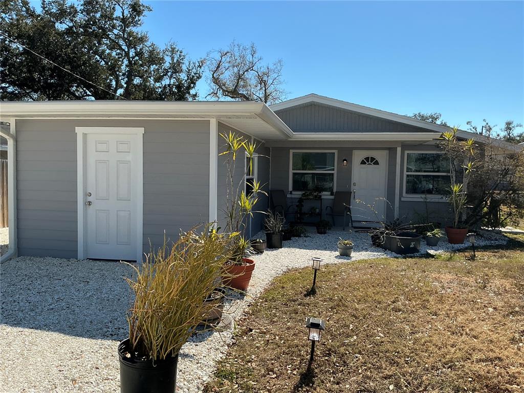 3020 Hawthorne Street Sarasota, FL 34239 - Photo 21 of 22 a view of a house with patio