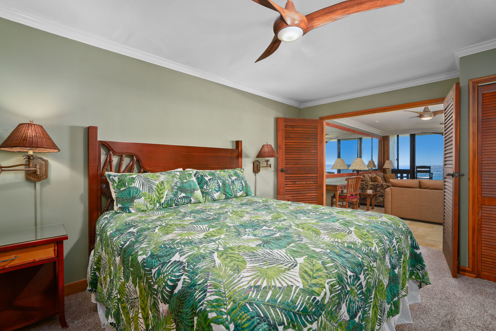 5050 Lawai Road, Unit 113 Koloa, HI 96756 - Photo 11 of 18 a large bed sitting in a bedroom next to a window