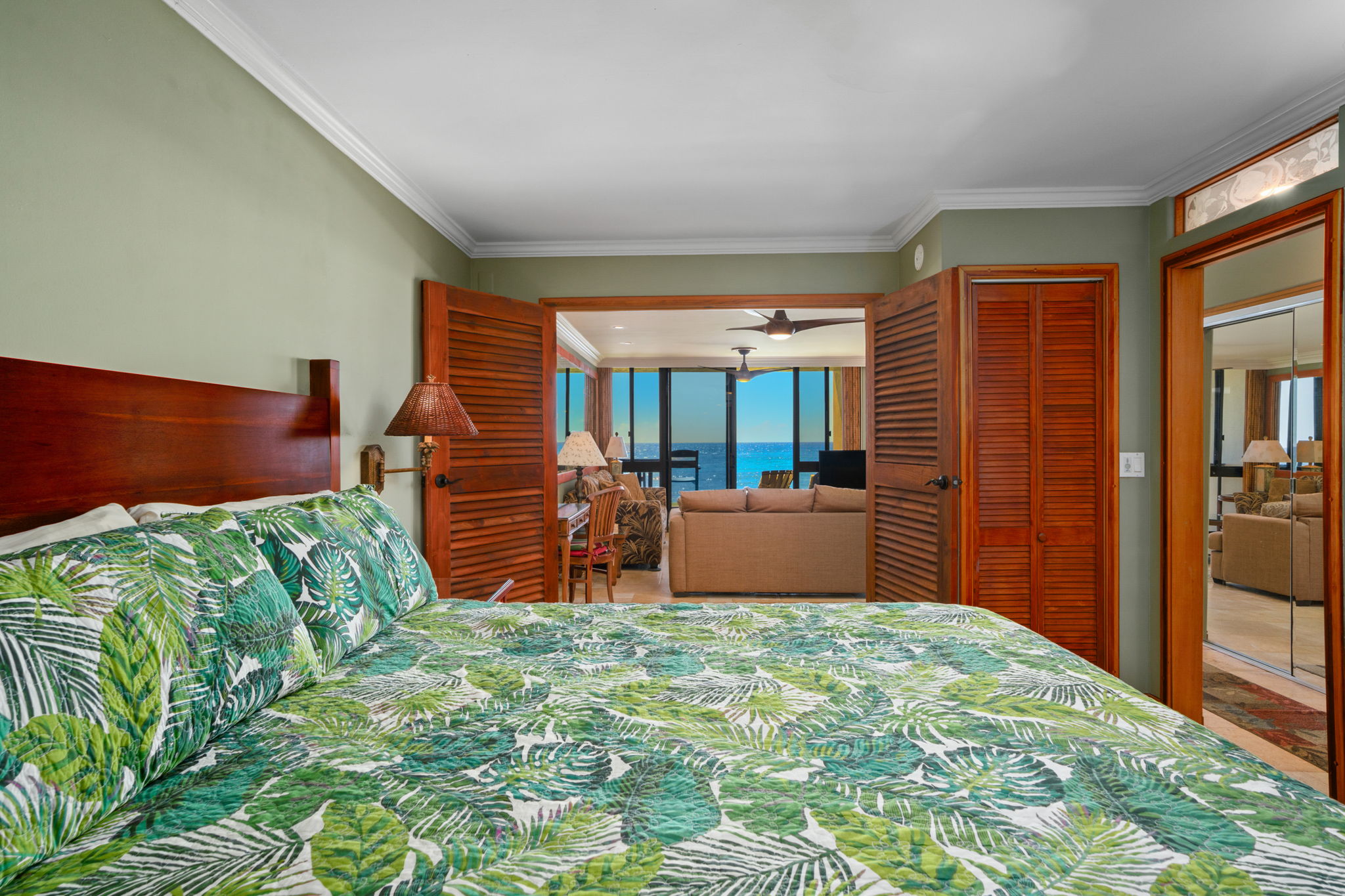 5050 Lawai Road, Unit 113 Koloa, HI 96756 - Photo 12 of 18 a bedroom with furniture and window