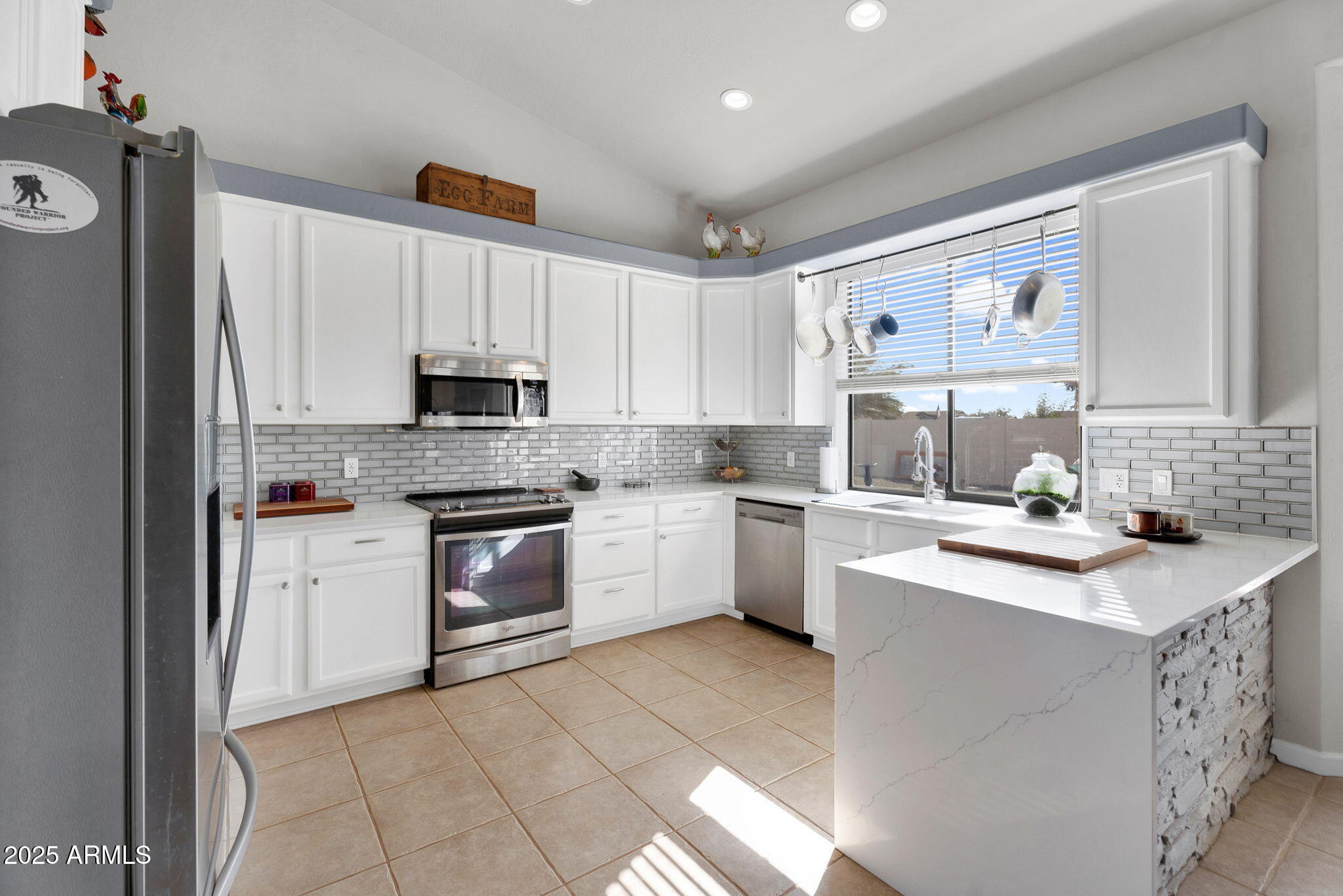 907 East Carlise Road Phoenix, AZ 85086 - Photo 13 of 70 a kitchen with a sink stove and microwave