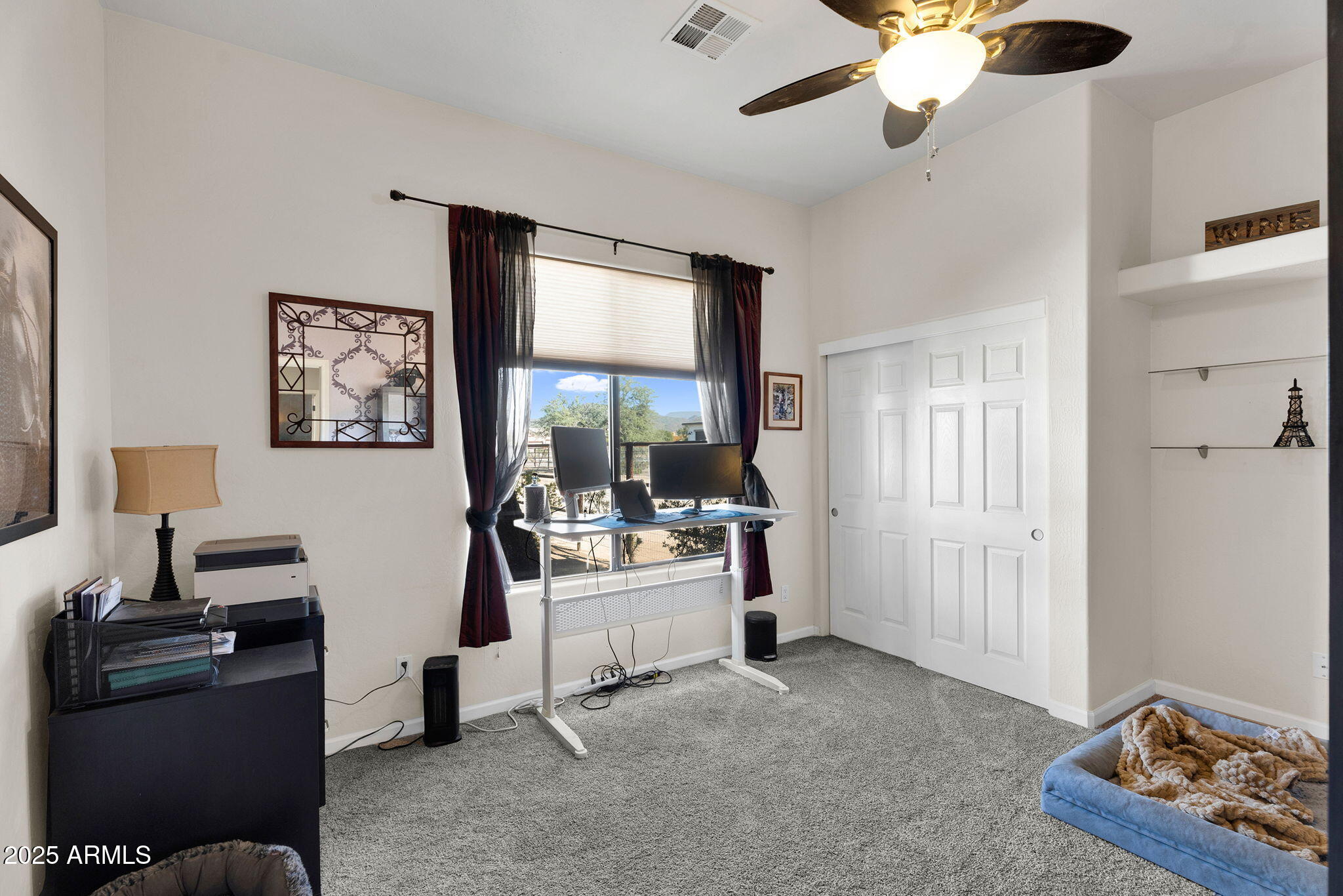 907 East Carlise Road Phoenix, AZ 85086 - Photo 27 of 70 a view of a livingroom with workspace and a window