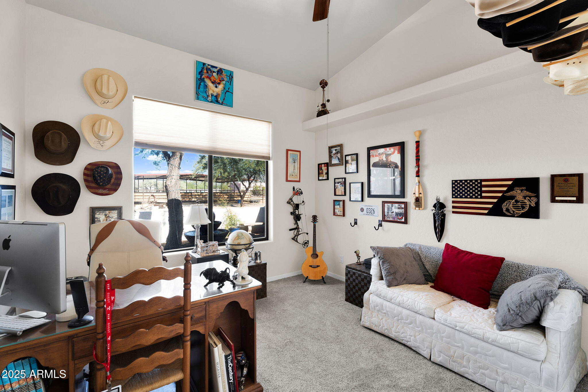 907 East Carlise Road Phoenix, AZ 85086 - Photo 29 of 70 a living room with furniture and a flat screen tv