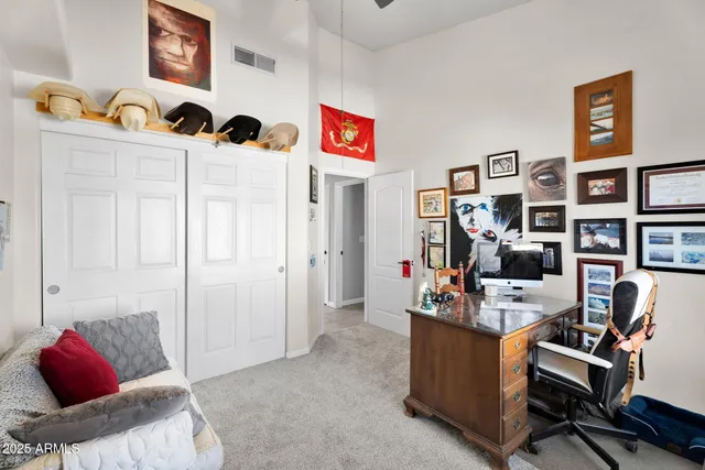 a view of a swimming pool and sitting area
