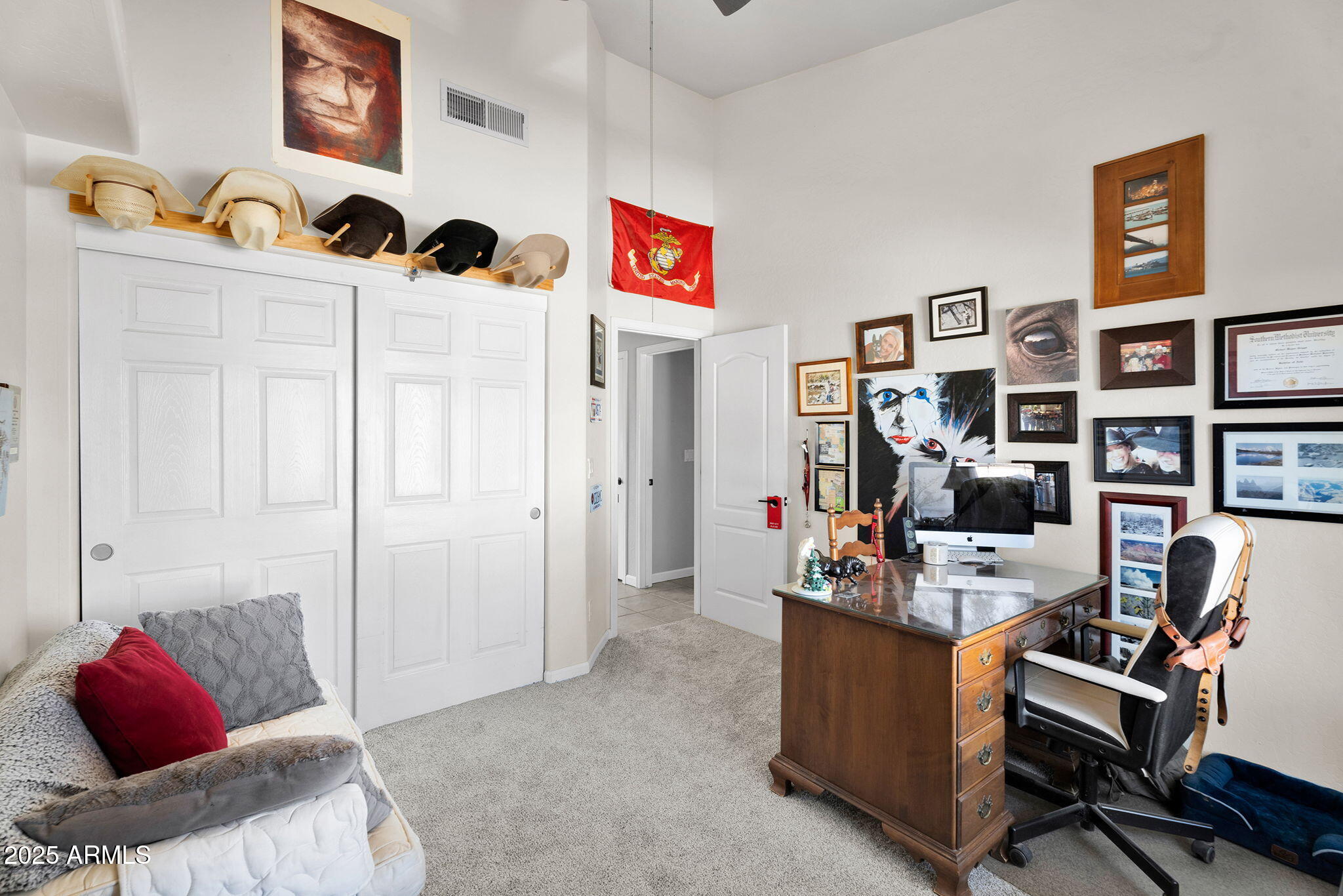 907 East Carlise Road Phoenix, AZ 85086 - Photo 30 of 70 a view of a workspace with workspace and a couch