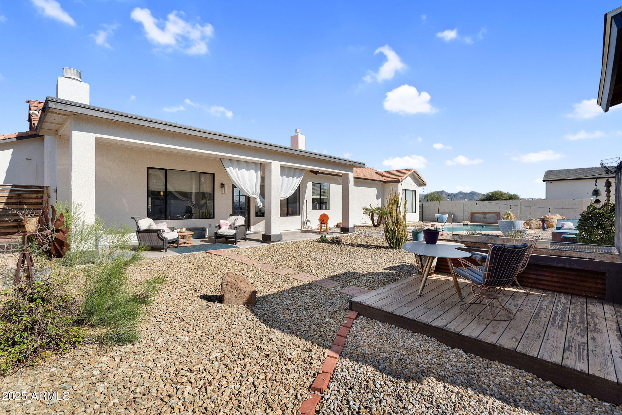 907 East Carlise Road Phoenix, AZ 85086 - Photo 39 of 70 a view of a swimming pool and sitting area