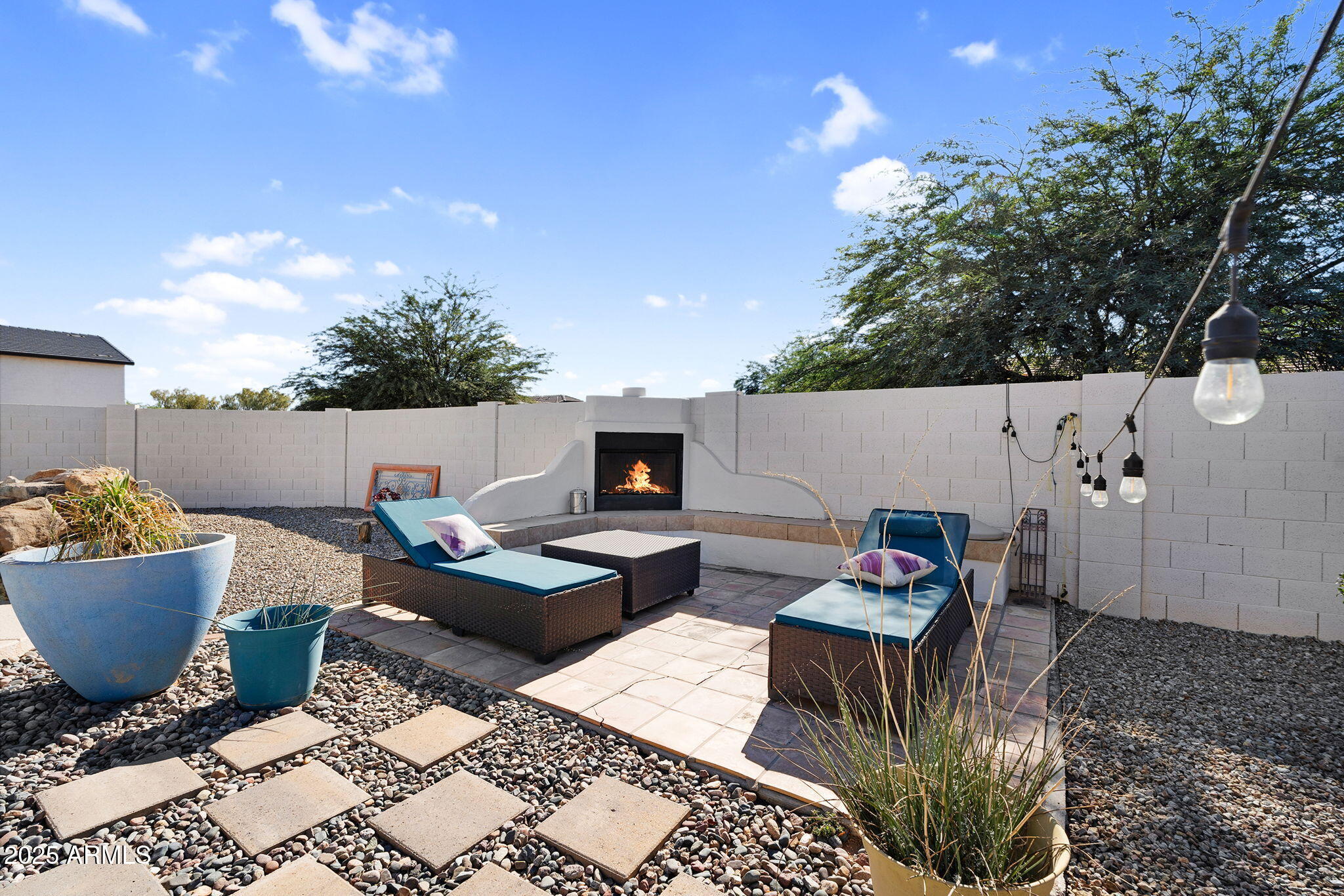 907 East Carlise Road Phoenix, AZ 85086 - Photo 44 of 70 a view of a backyard with furniture and a fire pit