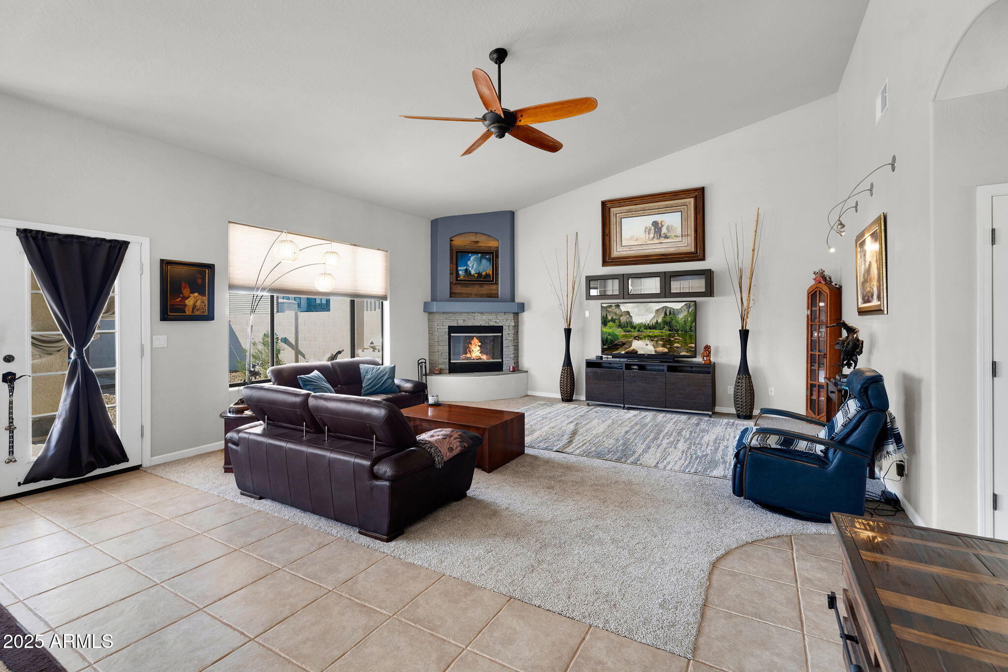 907 East Carlise Road Phoenix, AZ 85086 - Photo 4 of 70 a living room with furniture and a flat screen tv