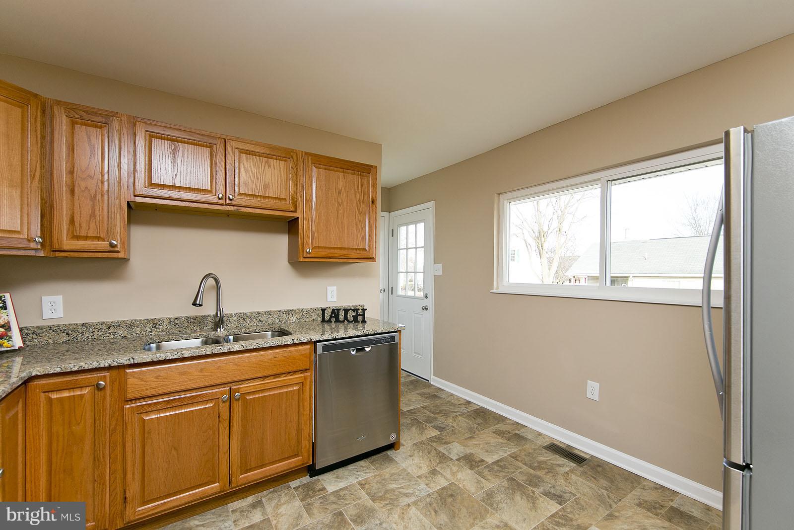 312 Russelcroft Road Winchester, VA 22601 - Photo 7 of 30 Kitchen w/new vinyl flooring