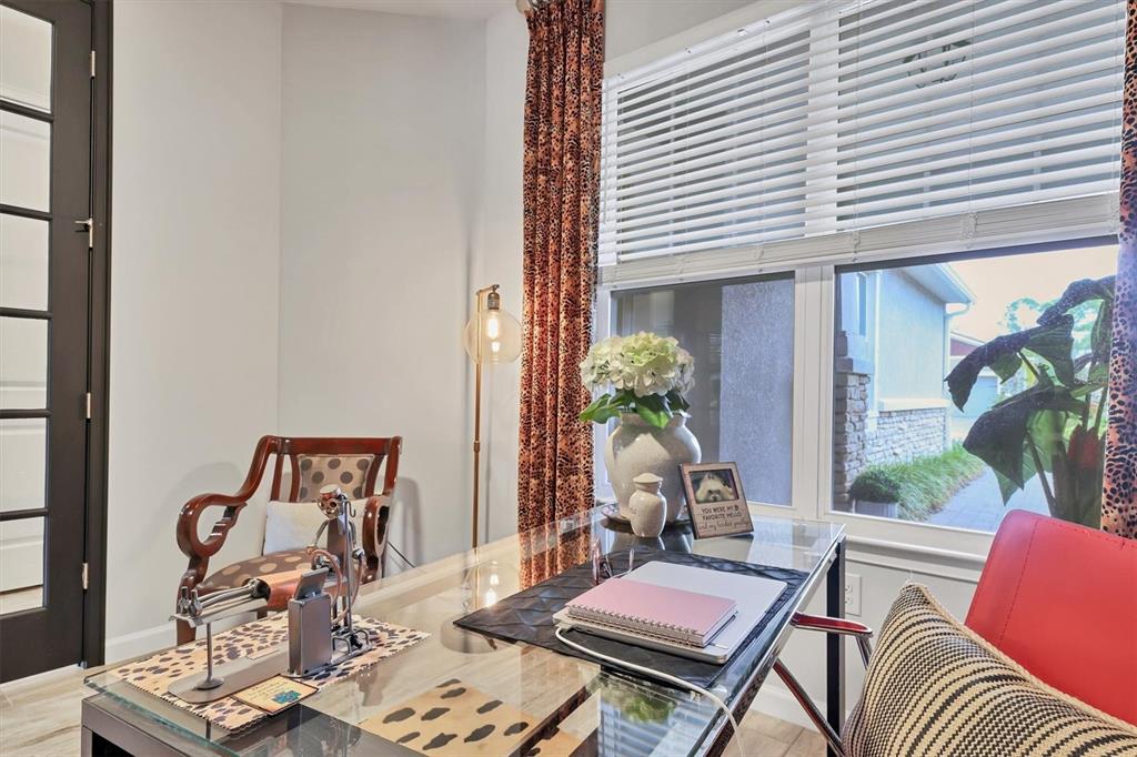 8733 Rain Song Road Sarasota, FL 34238 - Photo 19 of 39 a outdoor living room with furniture and a potted plant