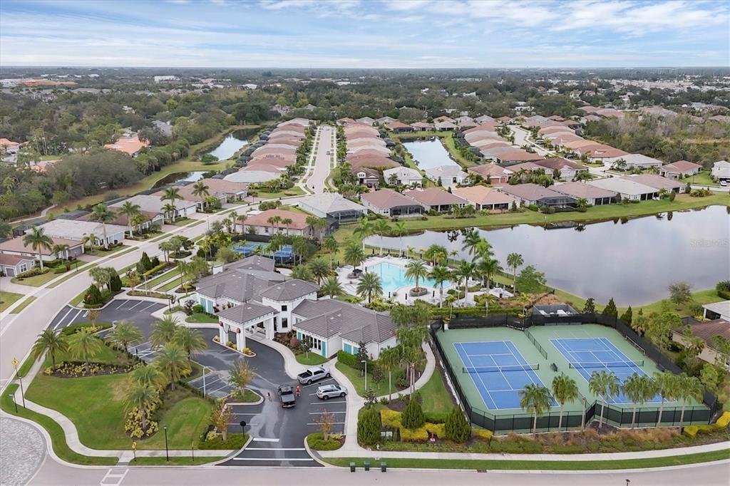 8733 Rain Song Road Sarasota, FL 34238 - Photo 38 of 39 an aerial view of residential houses with outdoor space