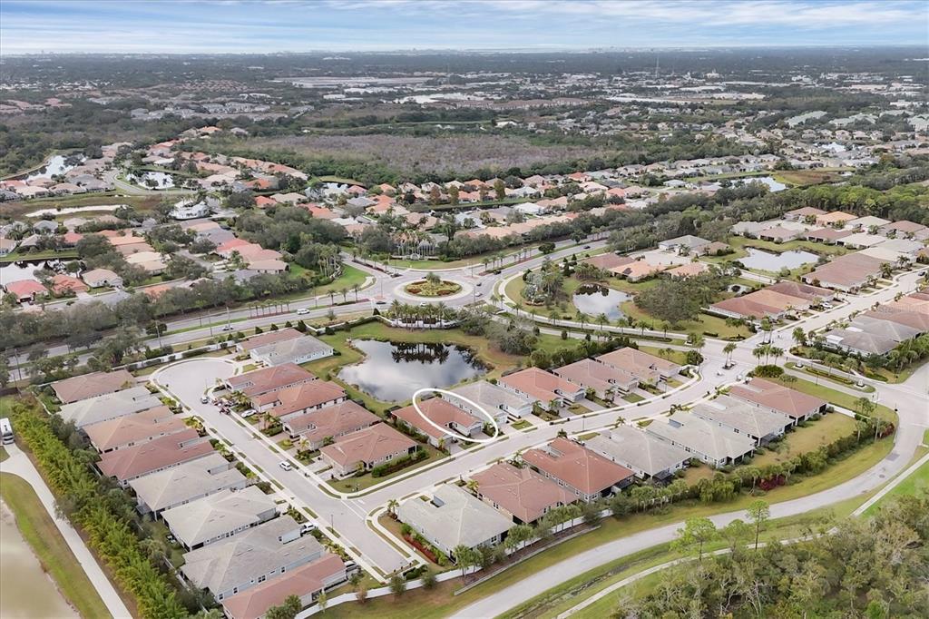 8733 Rain Song Road Sarasota, FL 34238 - Photo 39 of 39 an aerial view of residential houses with outdoor space