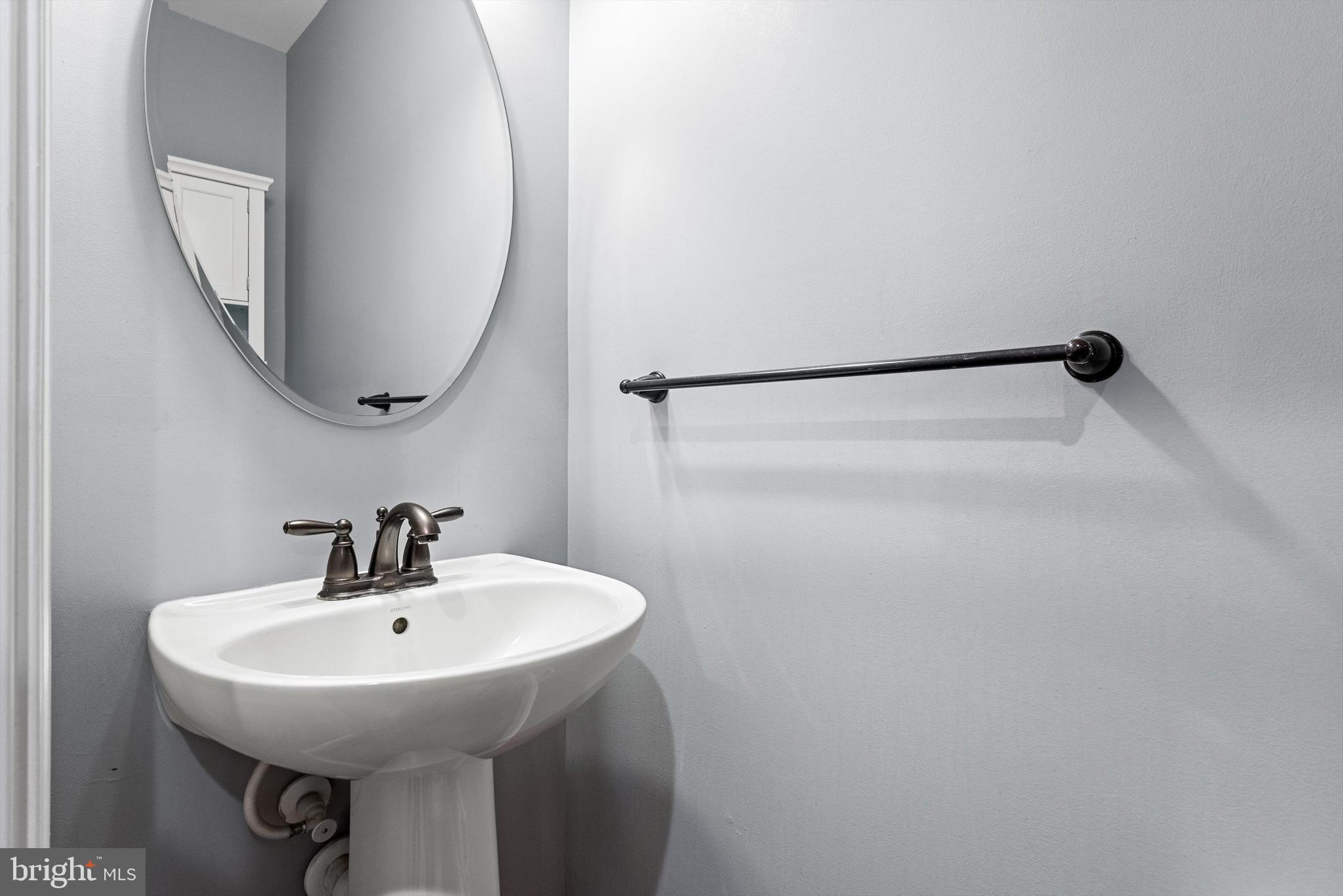 15511 Hillview Court Culpeper, VA 22701 - Photo 19 of 39 a bathroom with a sink and a mirror