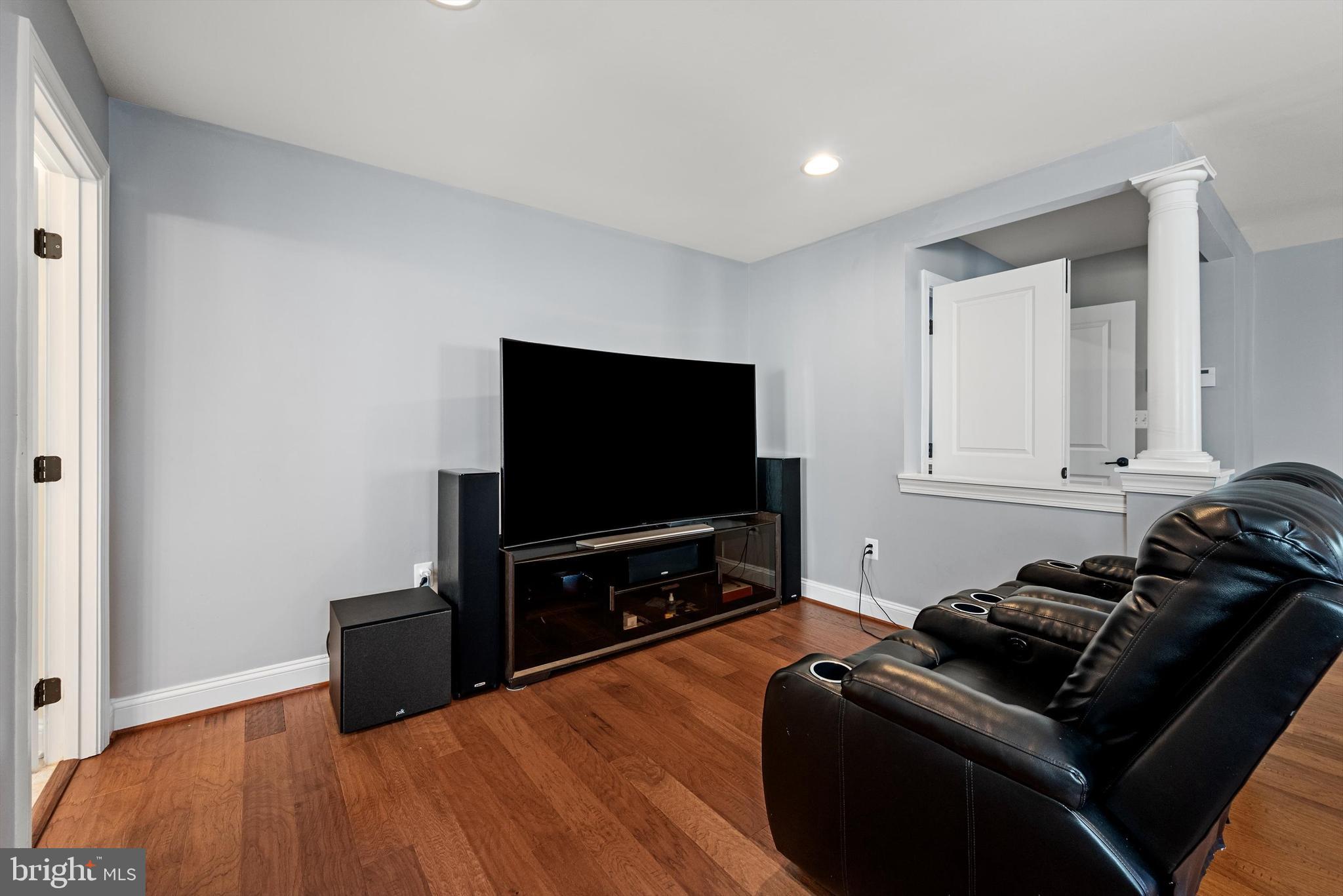 15511 Hillview Court Culpeper, VA 22701 - Photo 21 of 39 a living room with furniture and a flat screen tv
