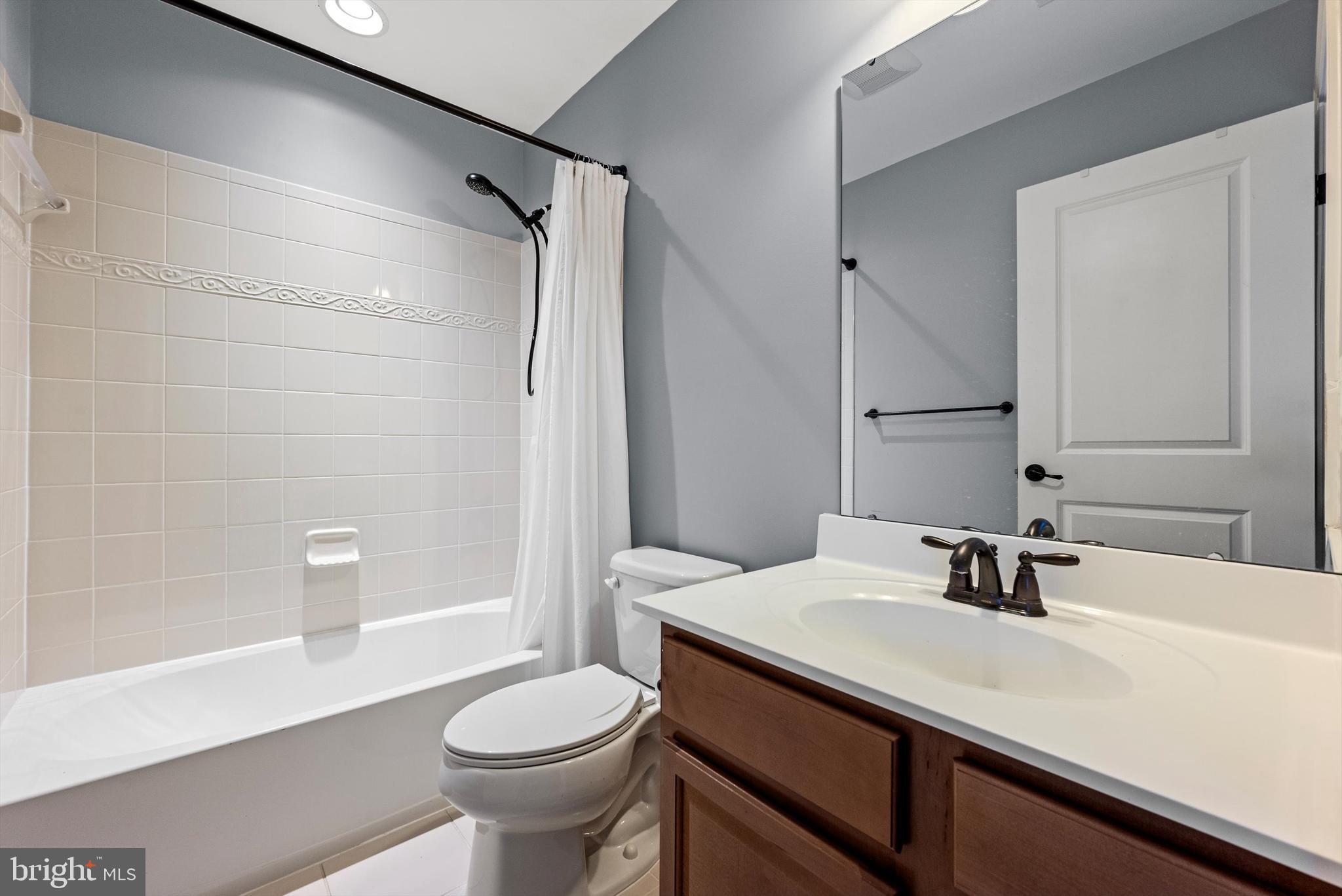 15511 Hillview Court Culpeper, VA 22701 - Photo 28 of 39 a bathroom with a sink a toilet and shower
