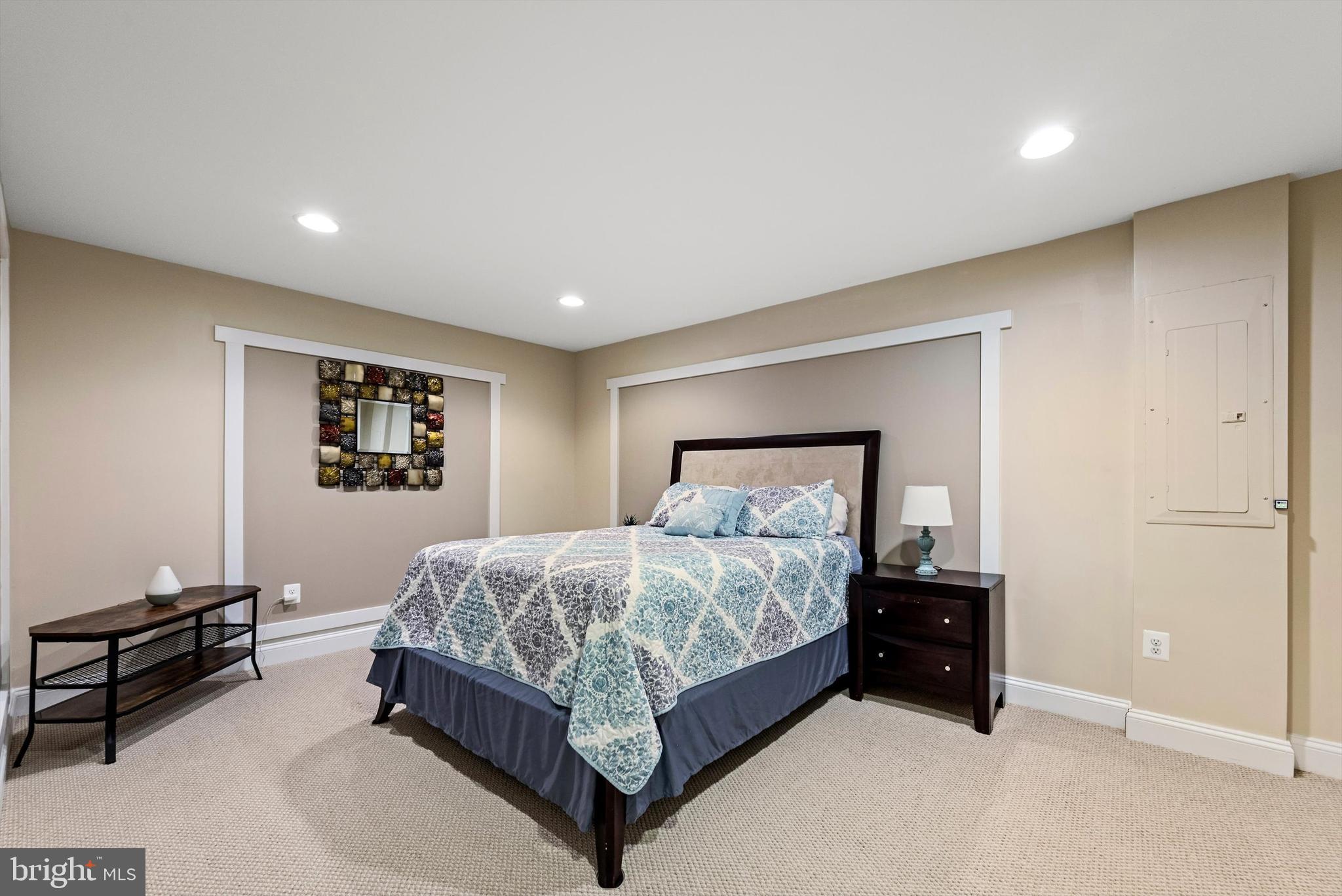 15511 Hillview Court Culpeper, VA 22701 - Photo 30 of 39 a bedroom with a bed and a night stand