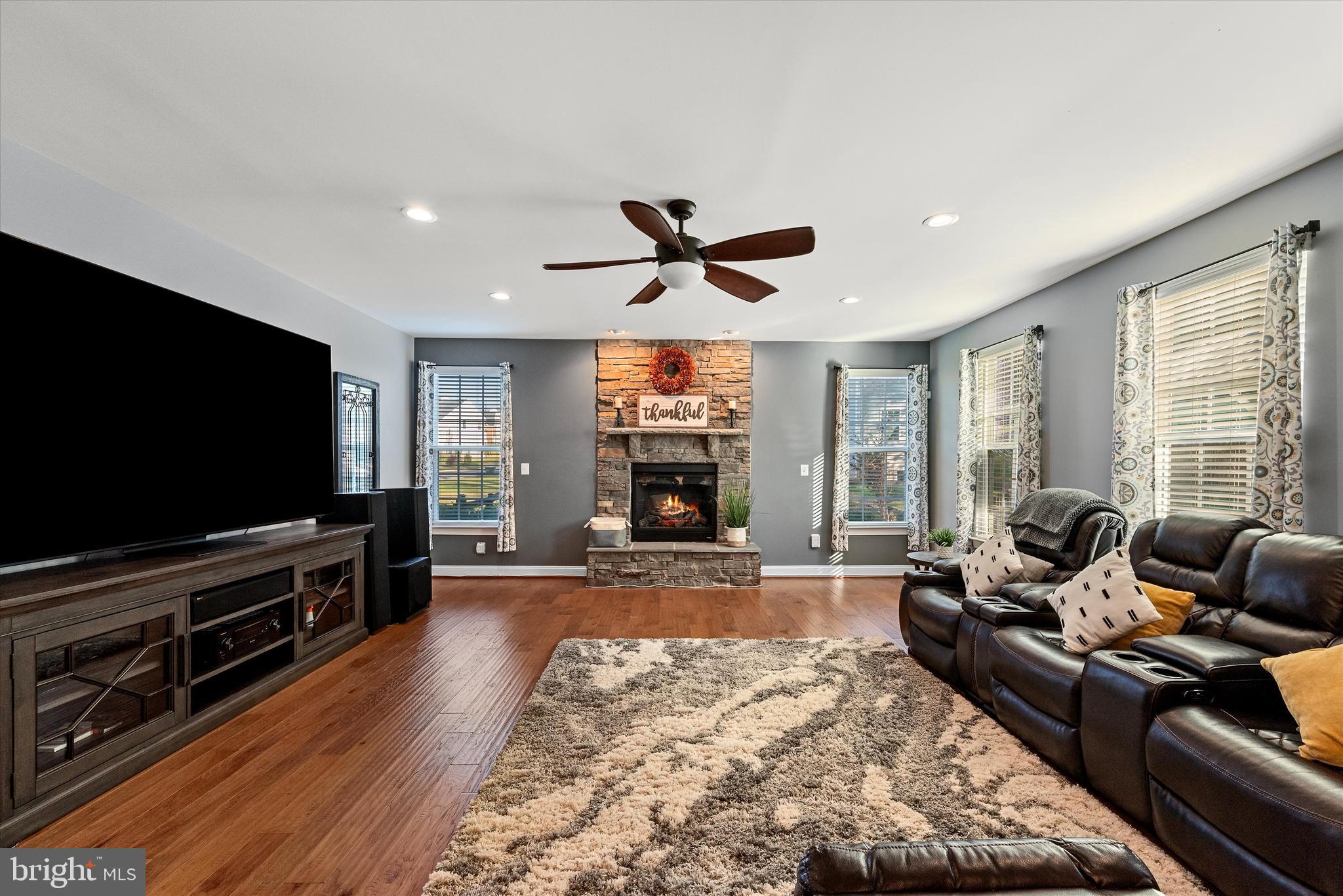 15511 Hillview Court Culpeper, VA 22701 - Photo 3 of 39 a living room with furniture and a flat screen tv