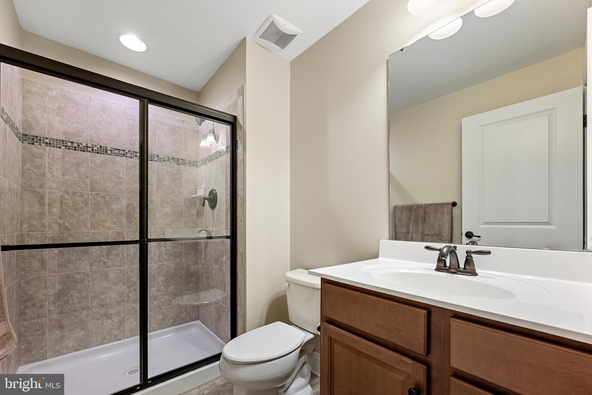 15511 Hillview Court Culpeper, VA 22701 - Photo 31 of 39 a bathroom with a sink toilet and shower