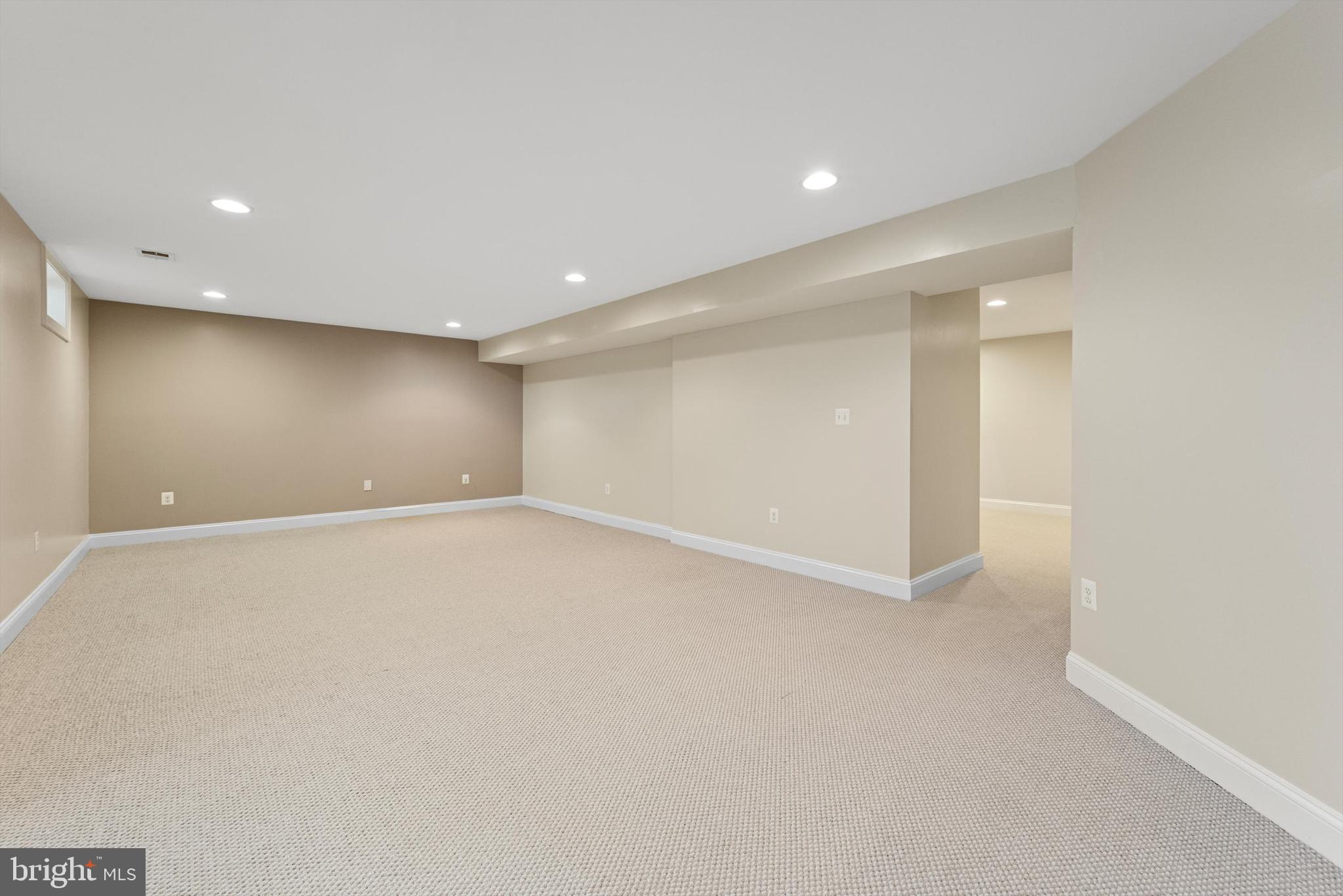 15511 Hillview Court Culpeper, VA 22701 - Photo 35 of 39 an empty room with wooden floor and windows