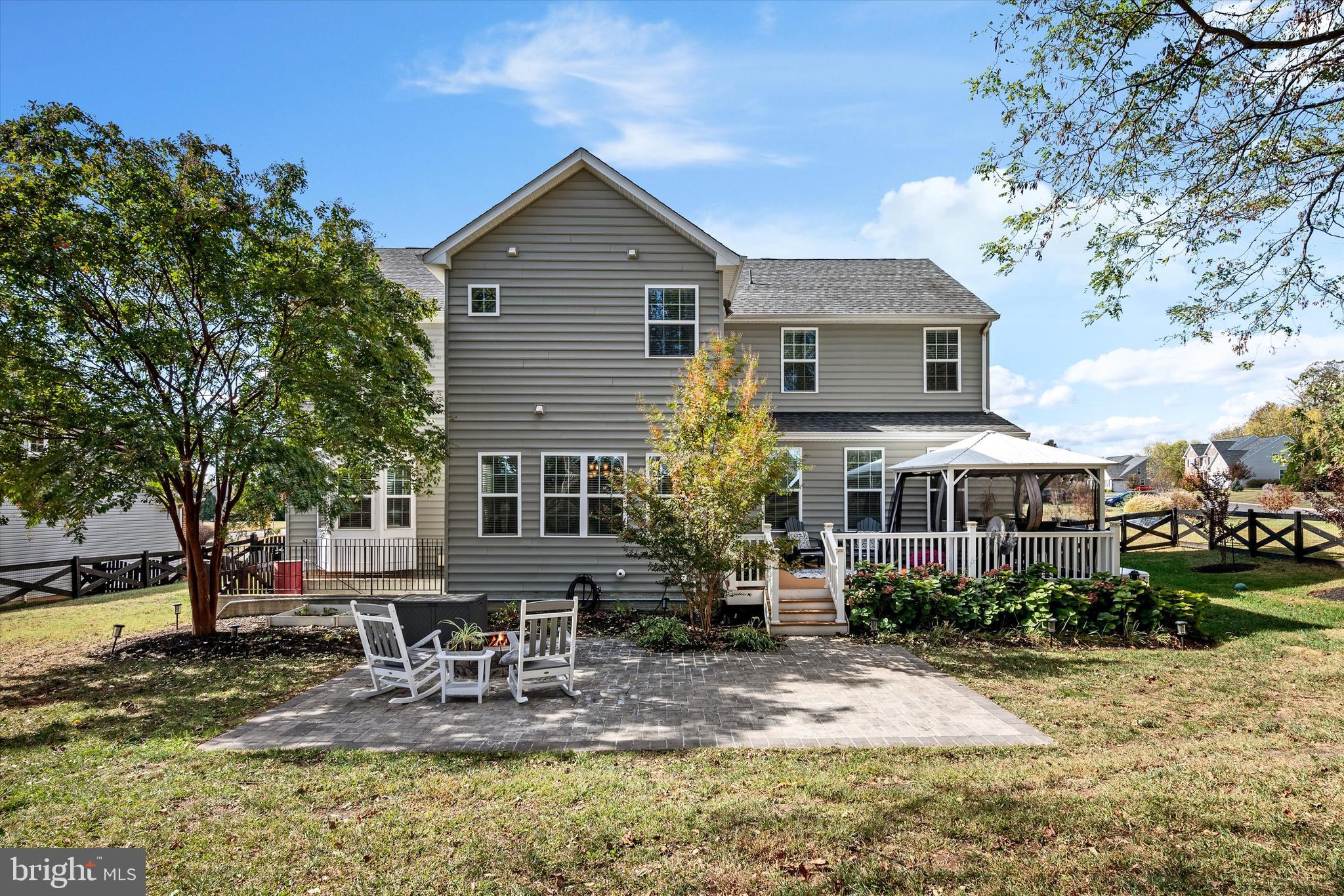 15511 Hillview Court Culpeper, VA 22701 - Photo 37 of 39 a view of a house with a yard and sitting area