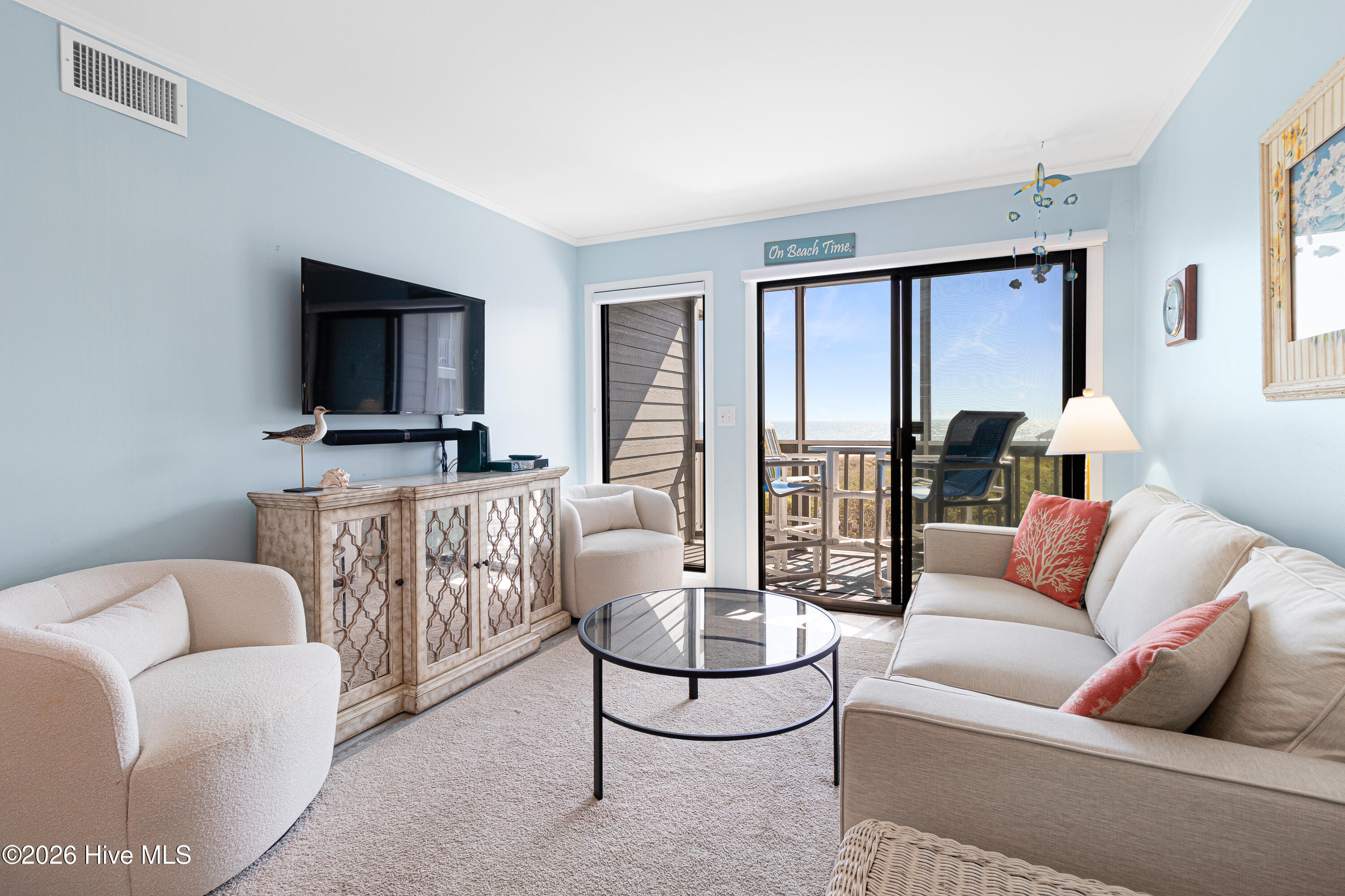 2111 West Fort Macon Road, Unit 248 DUNESCAPE Atlantic Beach, NC 28512 - Photo 3 of 45 Living room with ocean views