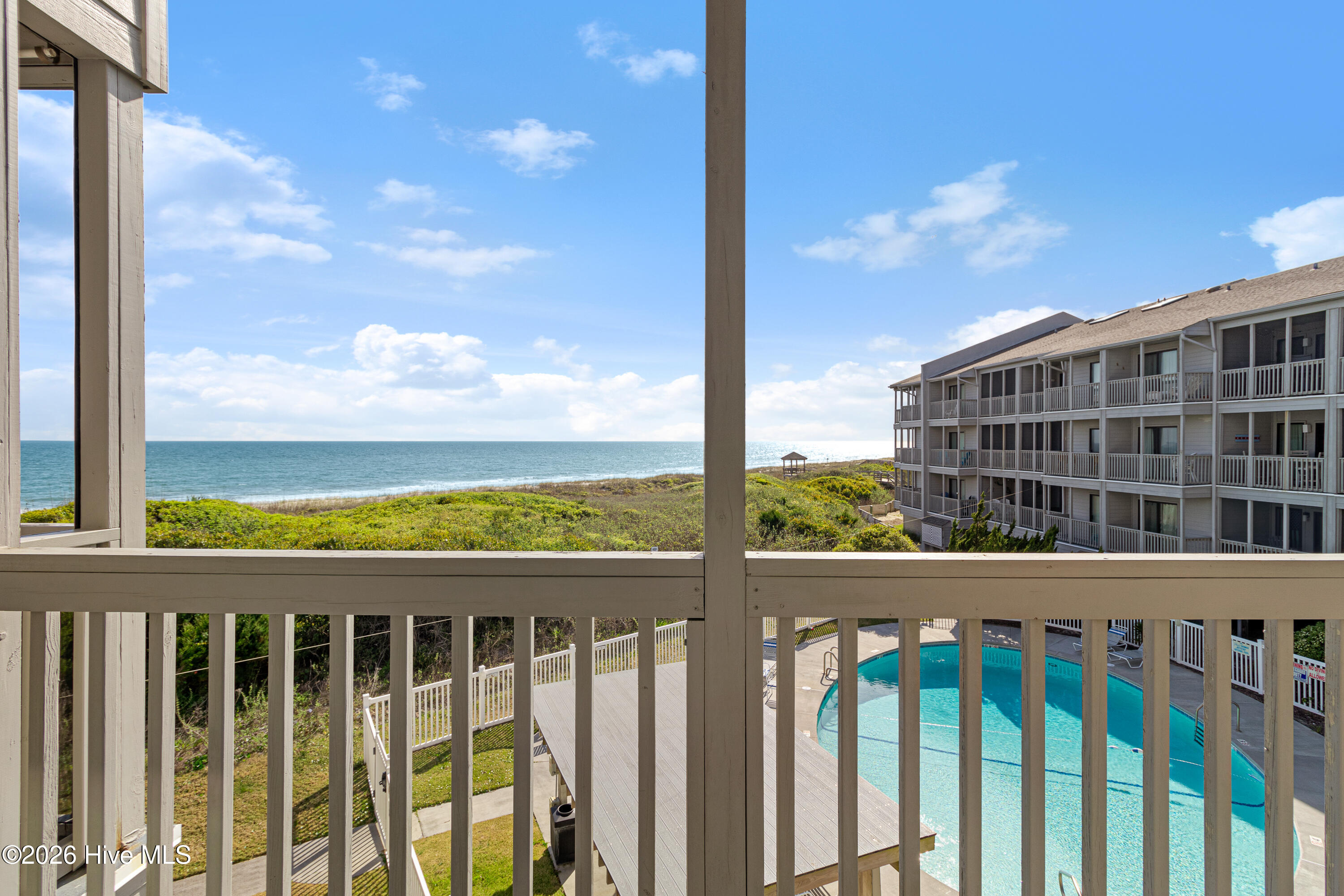 2111 West Fort Macon Road, Unit 248 DUNESCAPE Atlantic Beach, NC 28512 - Photo 7 of 45 Covered deck off of primary suite