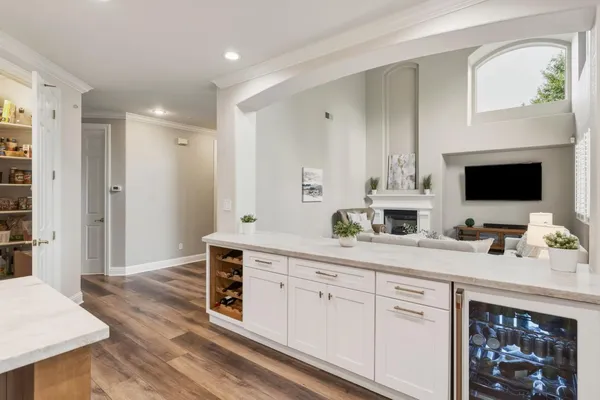 a spacious bathroom with a double vanity sink and a mirror