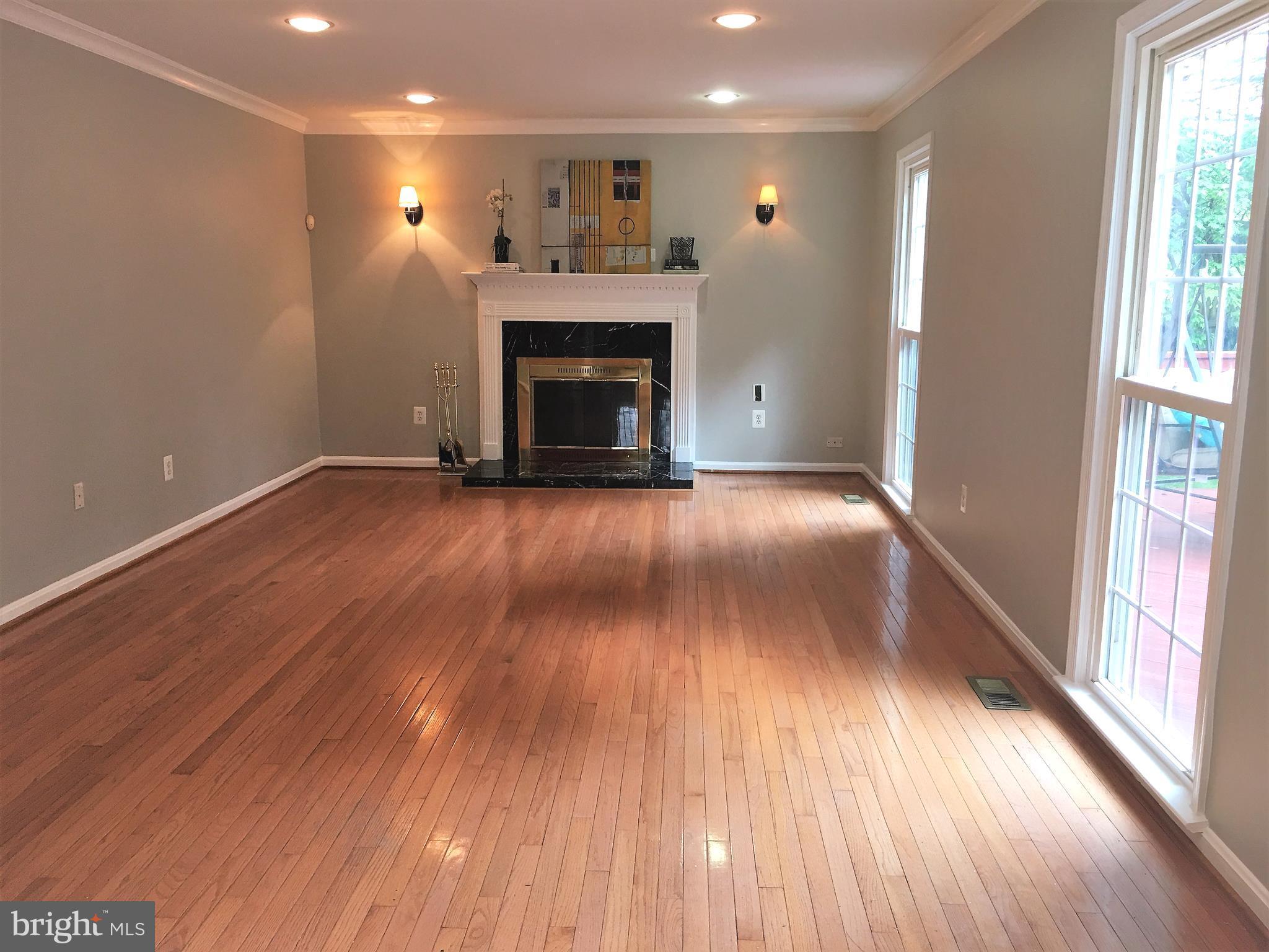 4917 Ten Mills Road Columbia, MD 21044 - Photo 8 of 28 Hardwood floors, wood burning fireplace