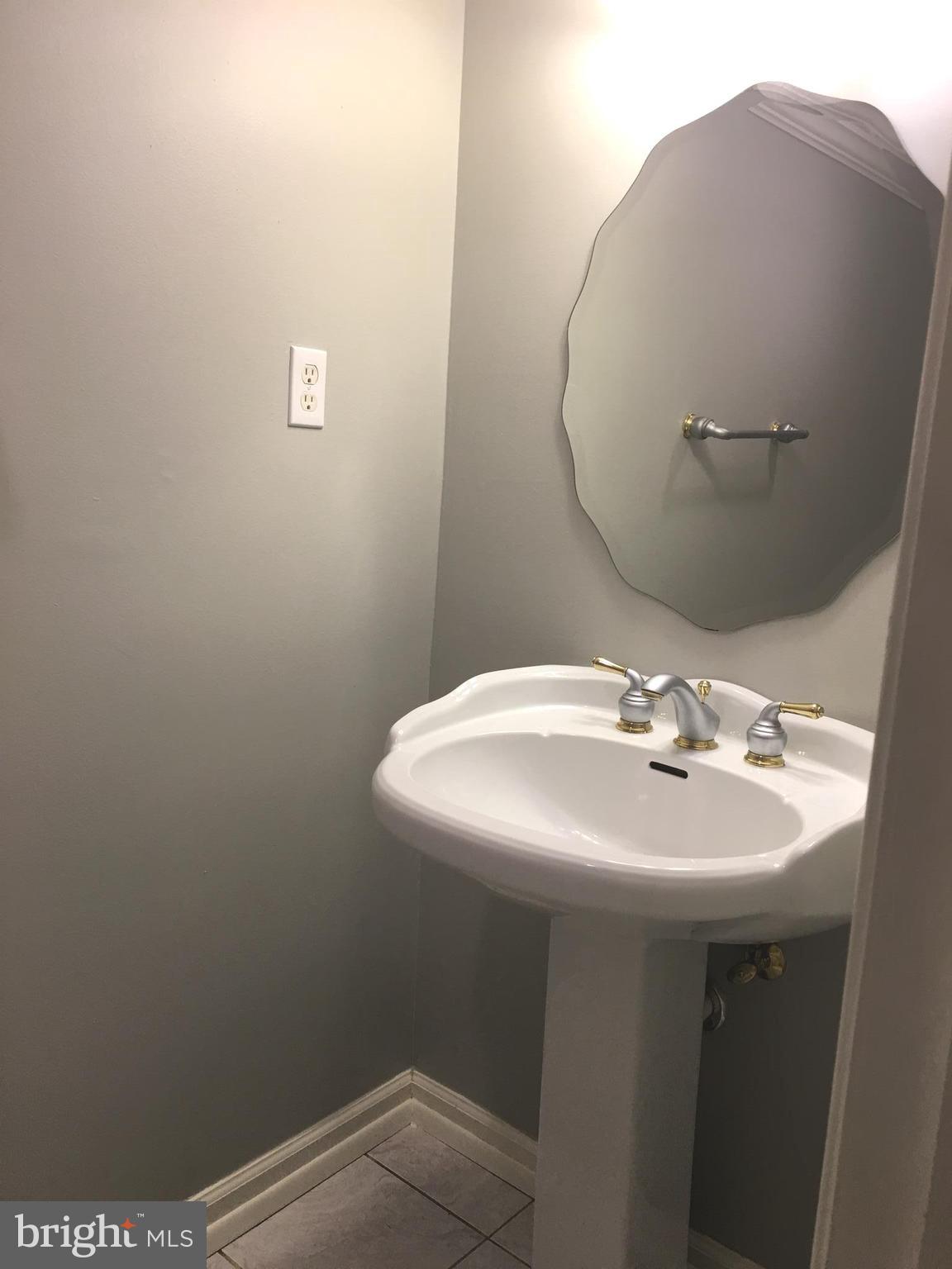 4917 Ten Mills Road Columbia, MD 21044 - Photo 10 of 28 half bath on main level