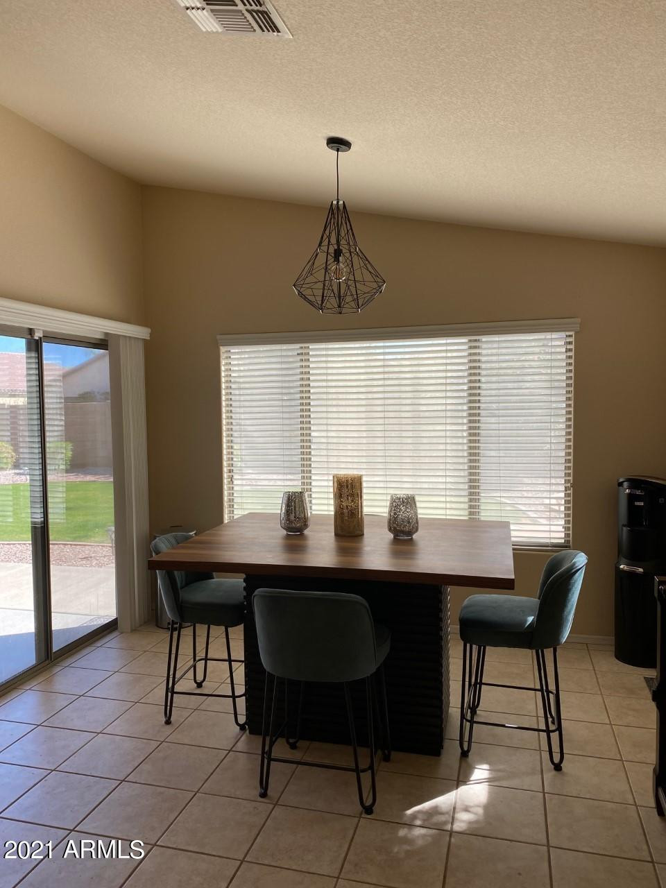 321 West Cardinal Way Chandler, AZ 85286 - Photo 3 of 7 a dining room with a table and chairs