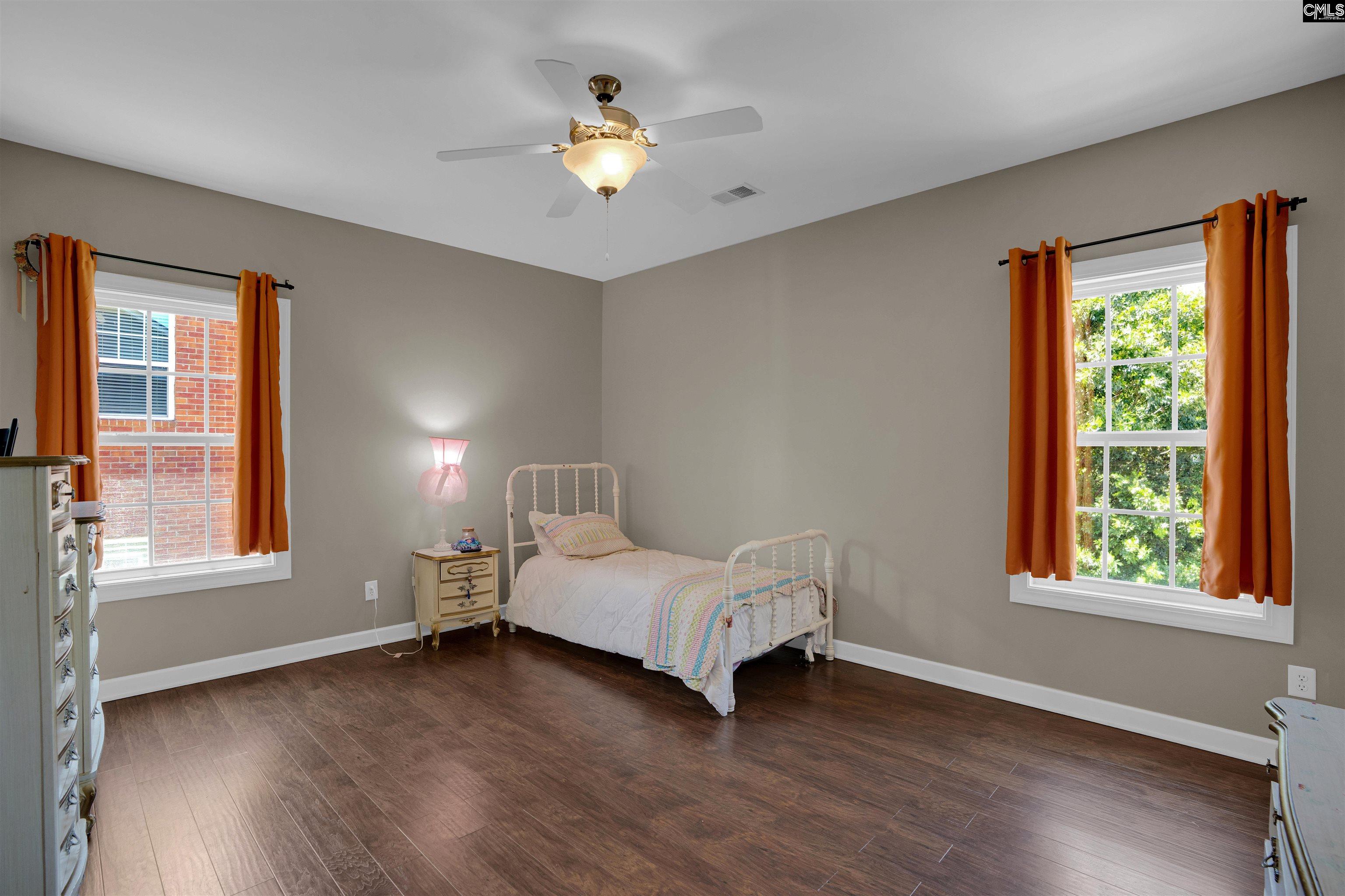 321 Asa Rose Lexington, SC 29072 - Photo 31 of 52 a living room with a bed furniture and a window