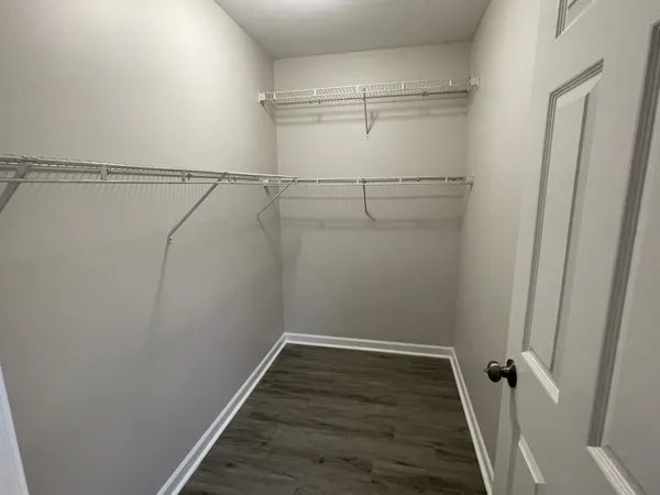 a view of a room with racks on the wall