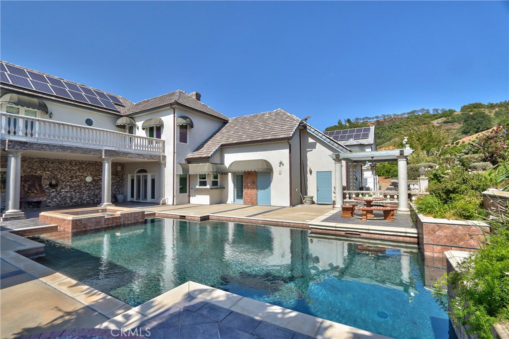46856 El Prado Road Temecula, CA 92590 - Photo 47 of 75 a front view of a house with garden